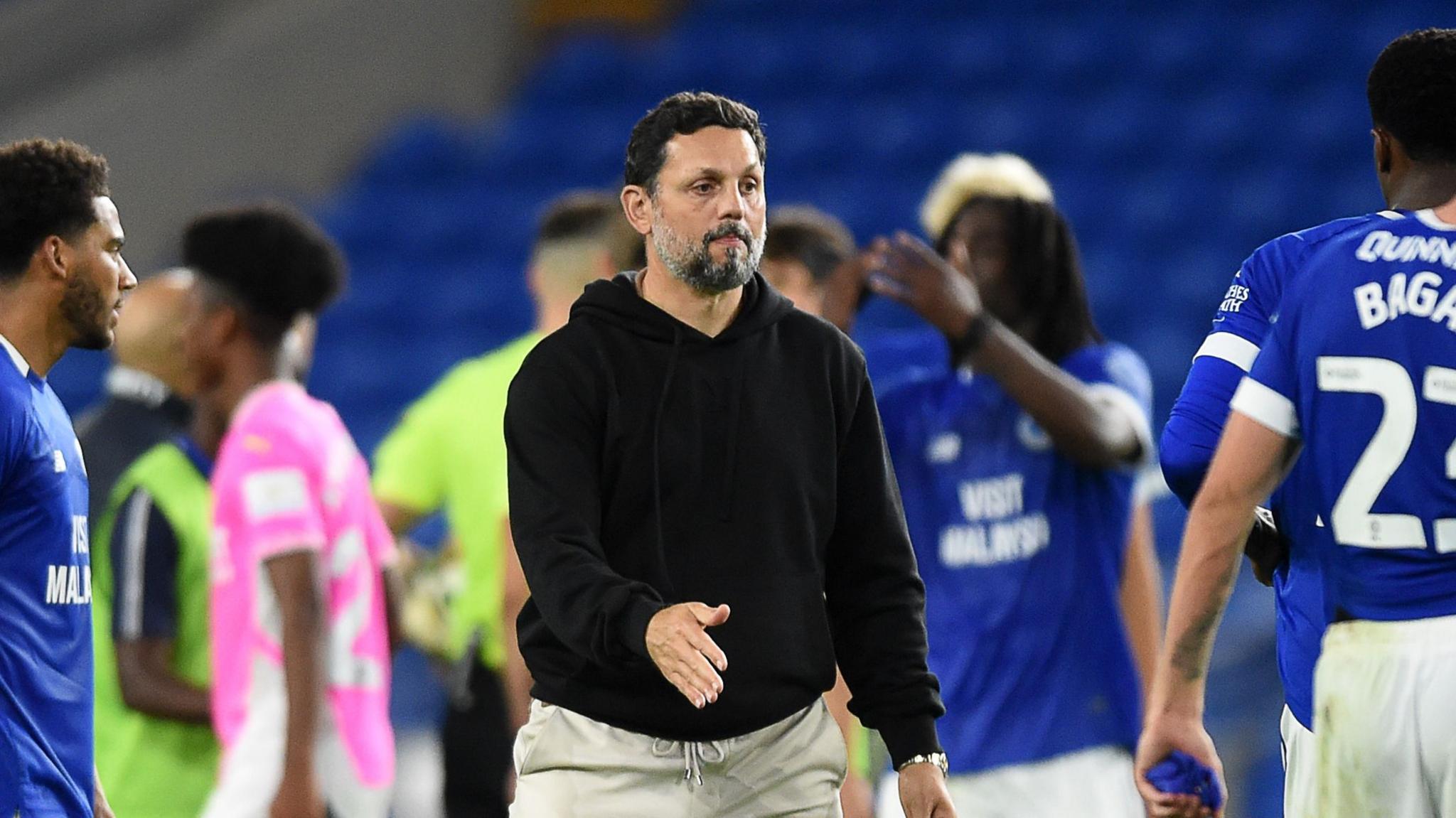 Cardiff City boss Erol Bulut shakes hands with his players