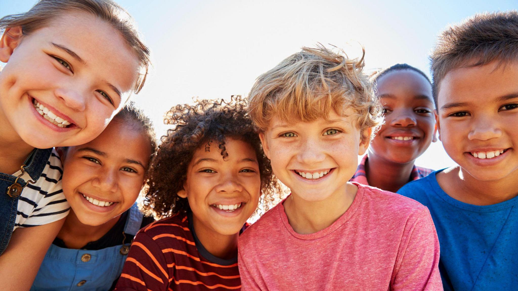 A group of smiling children.