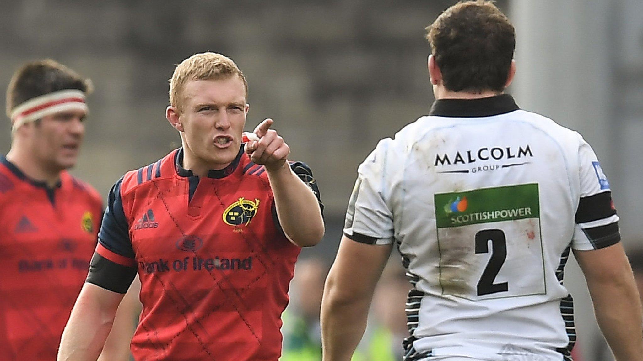 Keith Earls talks with Glasgow's Fraser Brown as he leaves the field following his red card