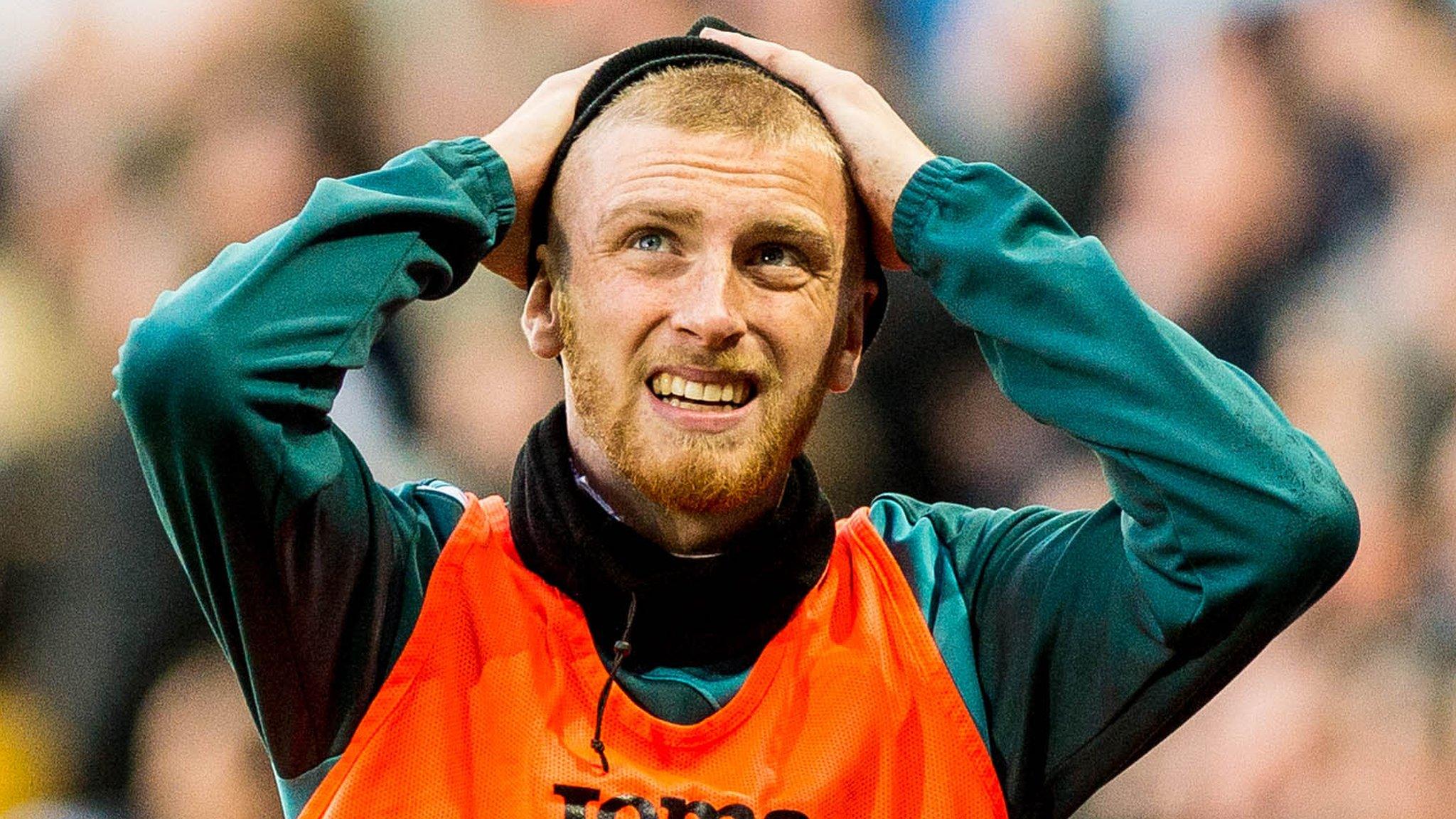 Oli McBurnie made his first Premier League start for Swansea in their defeat at Liverpool.