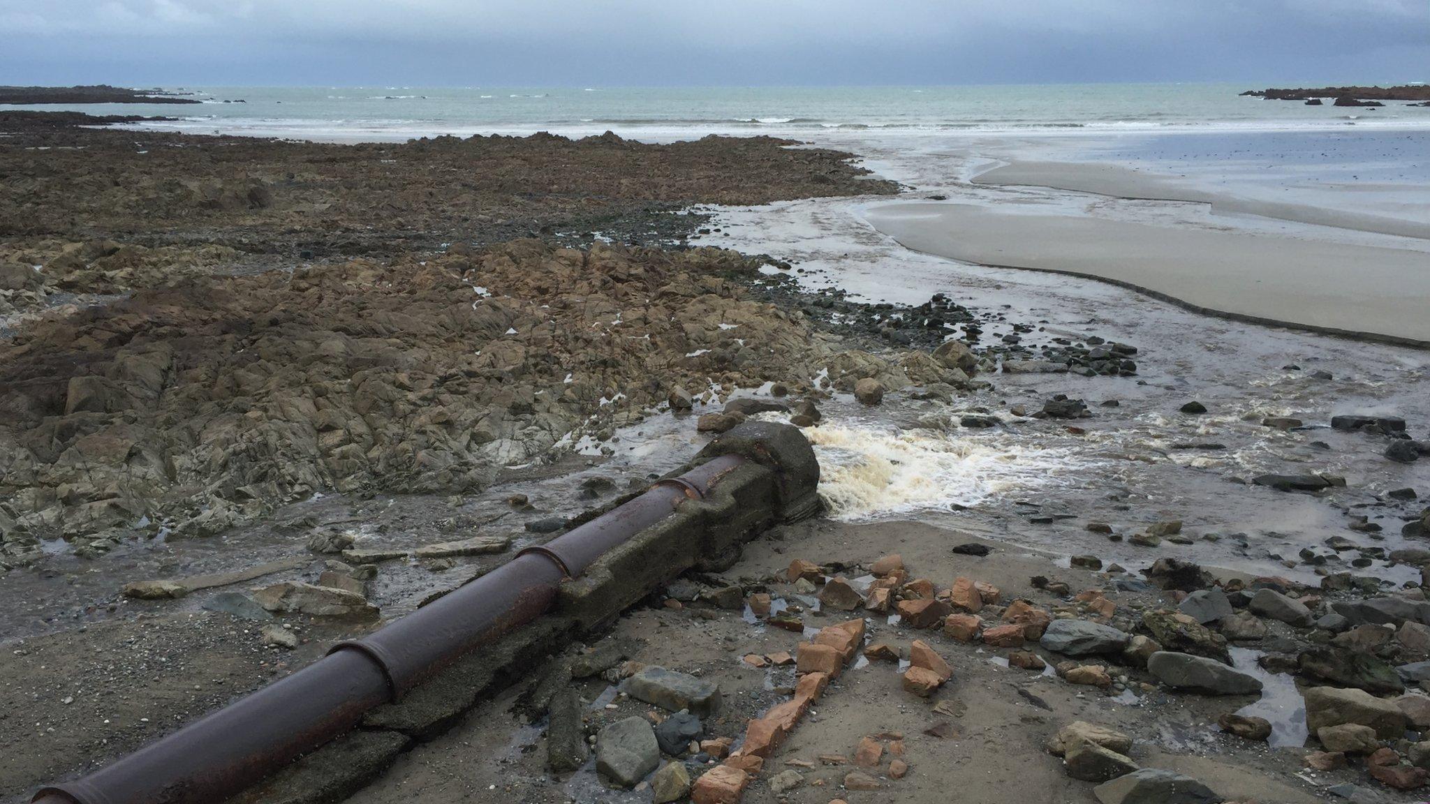 Sewage pouring onto the beach at Vazon, Guernsey