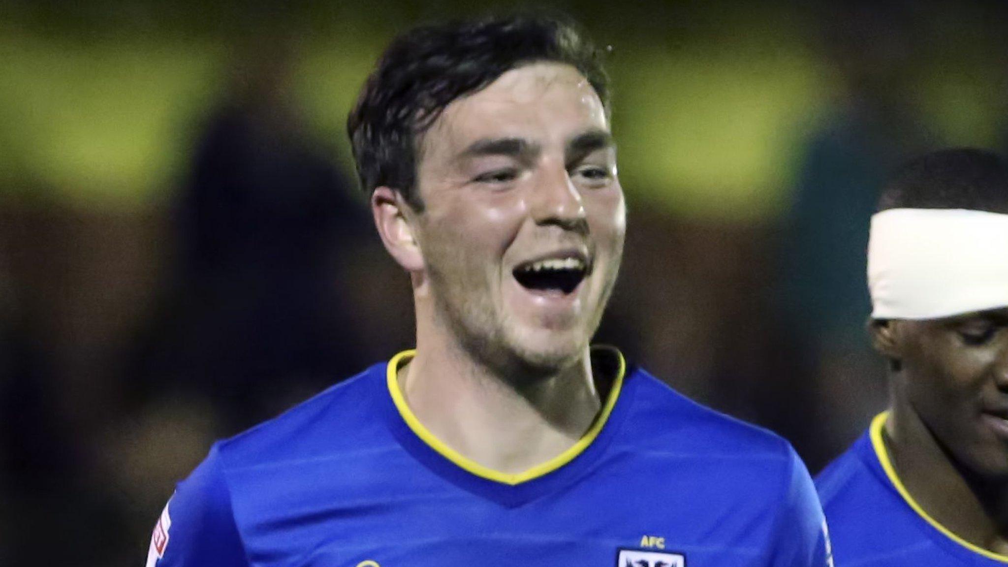 Sean Kelly celebrates scoring for AFC Wimbledon