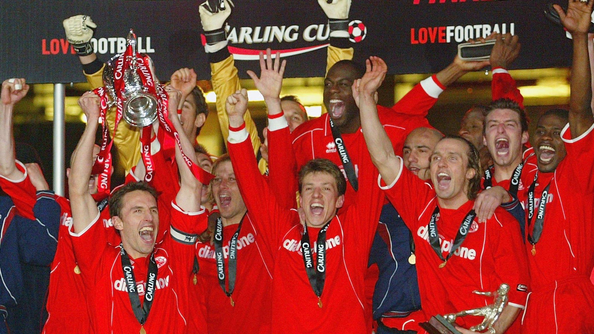 Middlesbrough players lift the trophy above after beating Bolton