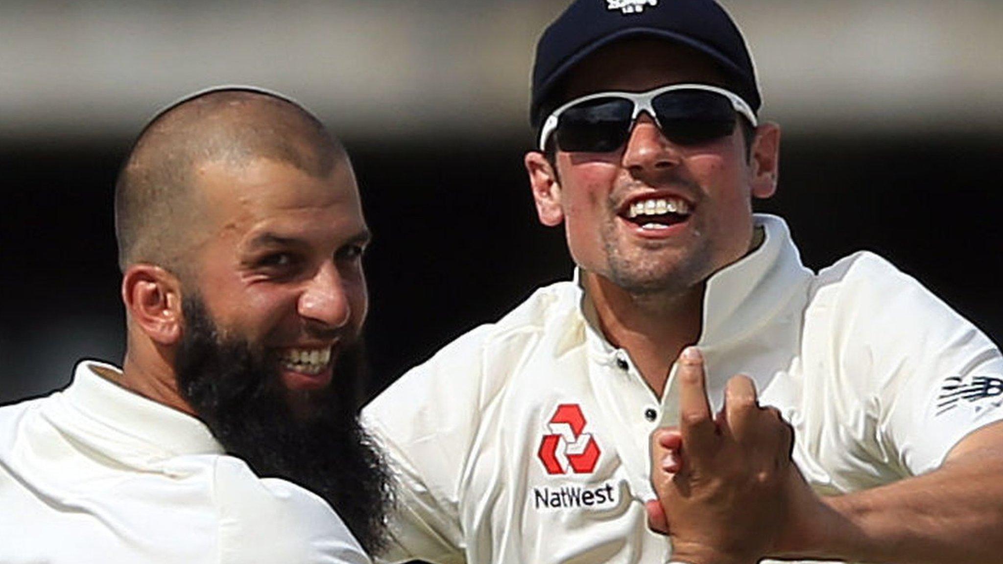 Alastair Cook celebrates a wicket with Moeen Ali