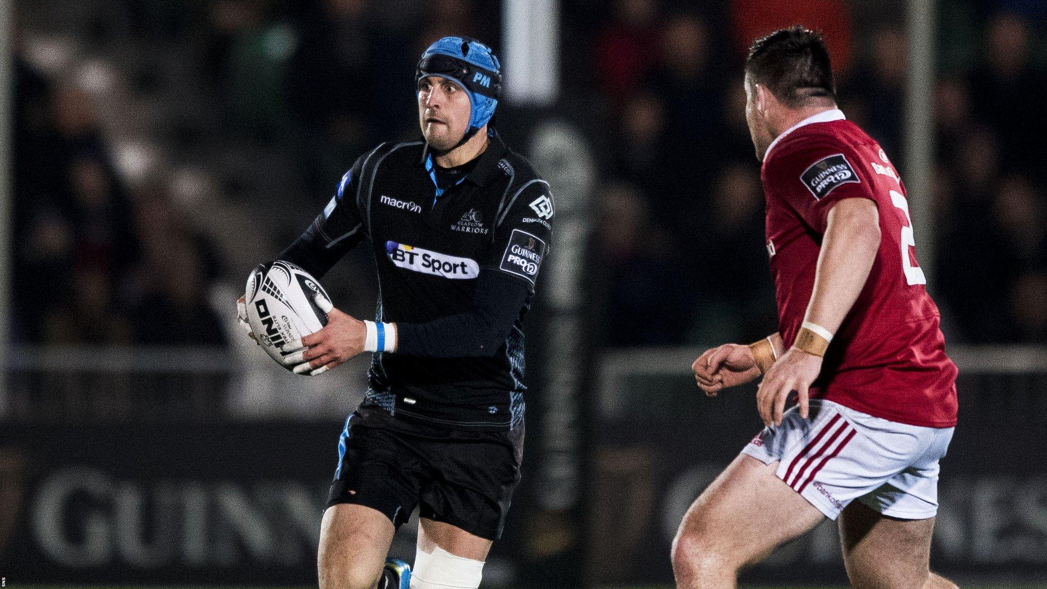 Peter Murchie attacks Munster in the narrow defeat for the Scots in the Pro12 in December