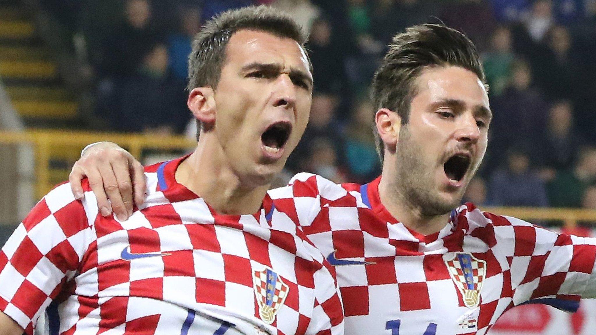 Croatia celebrate after Mario Mandzukic opens the scoring at Windsor Park