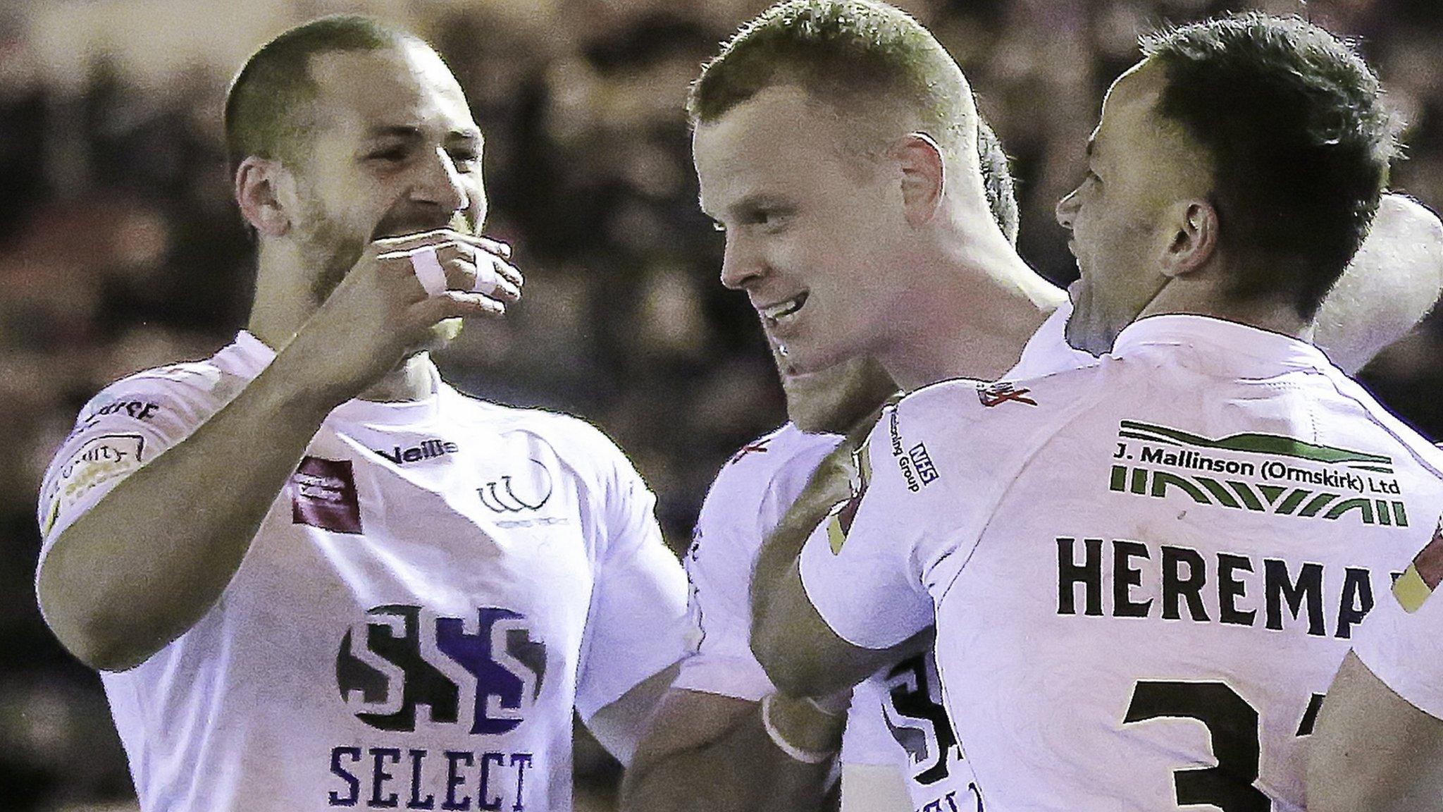 Widnes captain Kevin Brown is in the middle of the celebrations