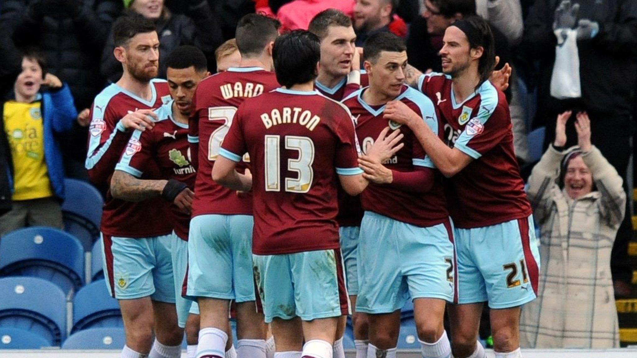 Burnley celebrate Sam Vokes' first half penalty