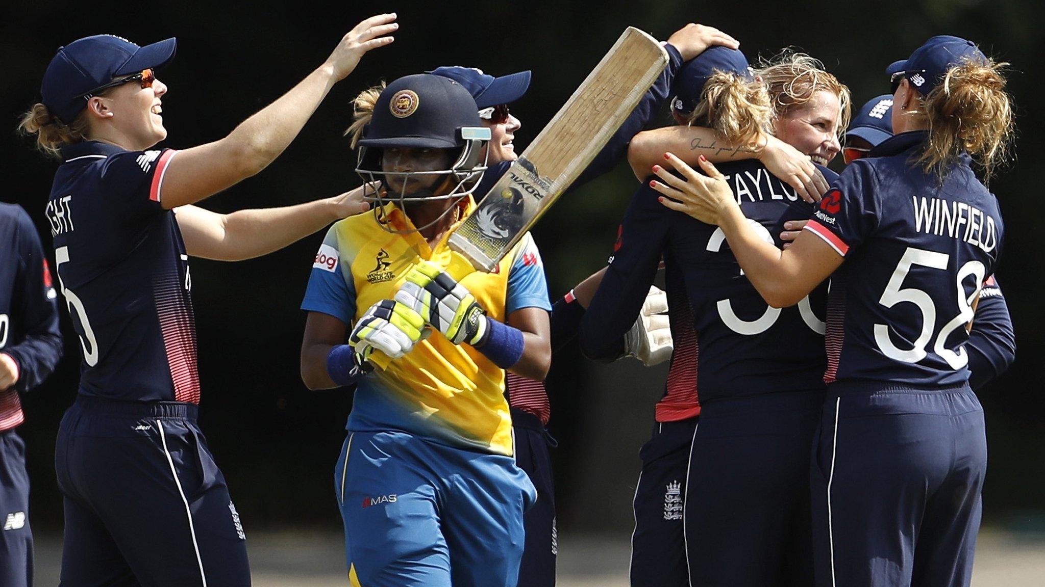 England celebrate a wicket by Katherine Brunt (second right)