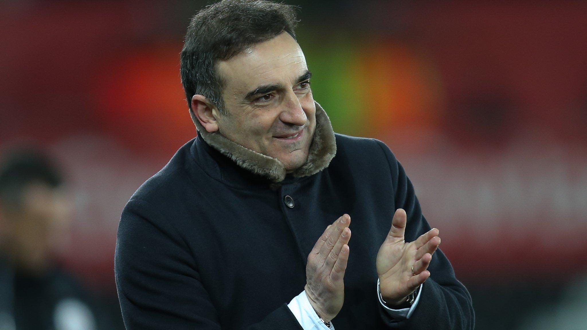 Carlos Carvalhal applauds his side's eighth goal against Notts County
