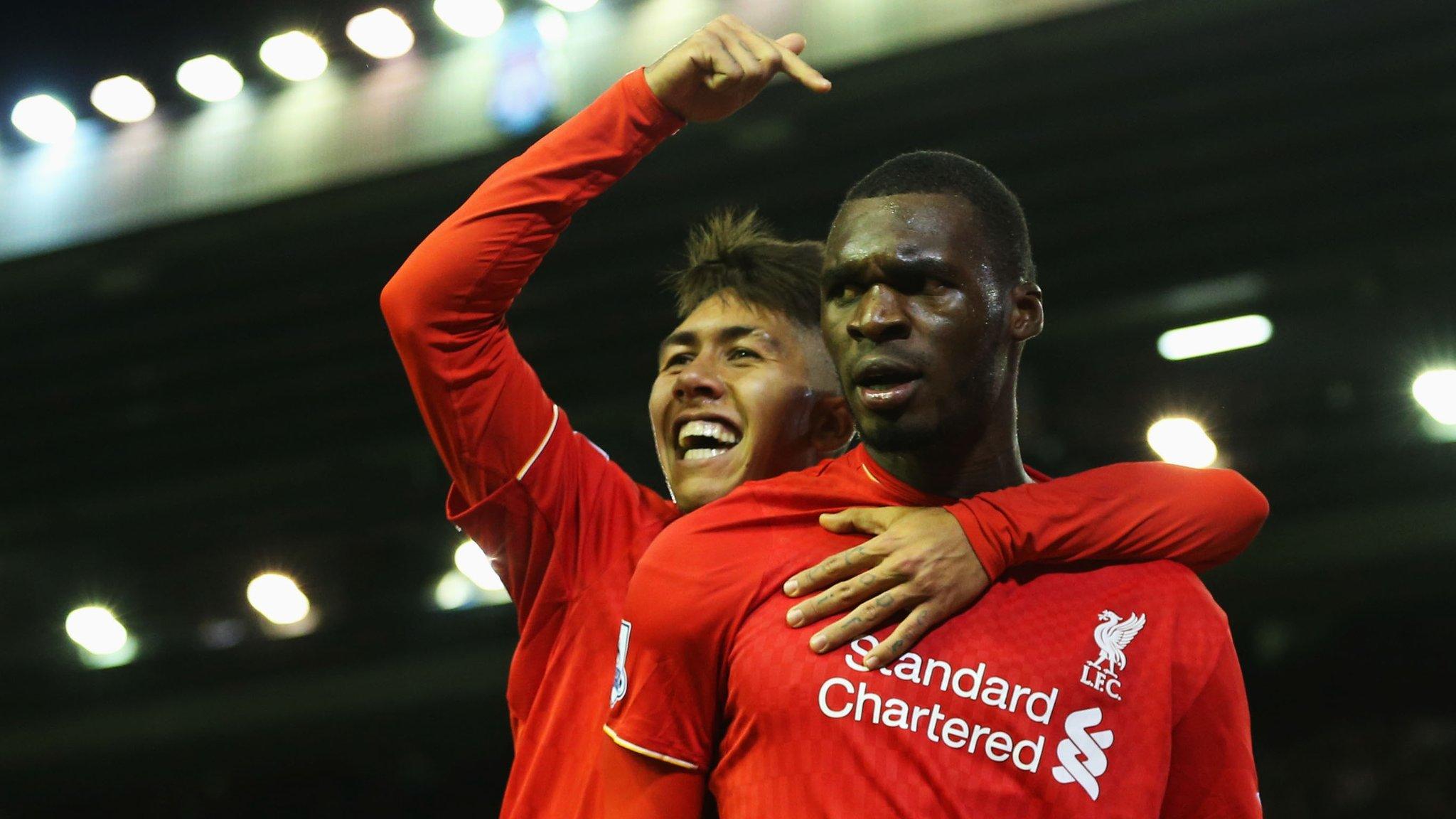 Christian Benteke being congratulated by team-mate Robert Firmino