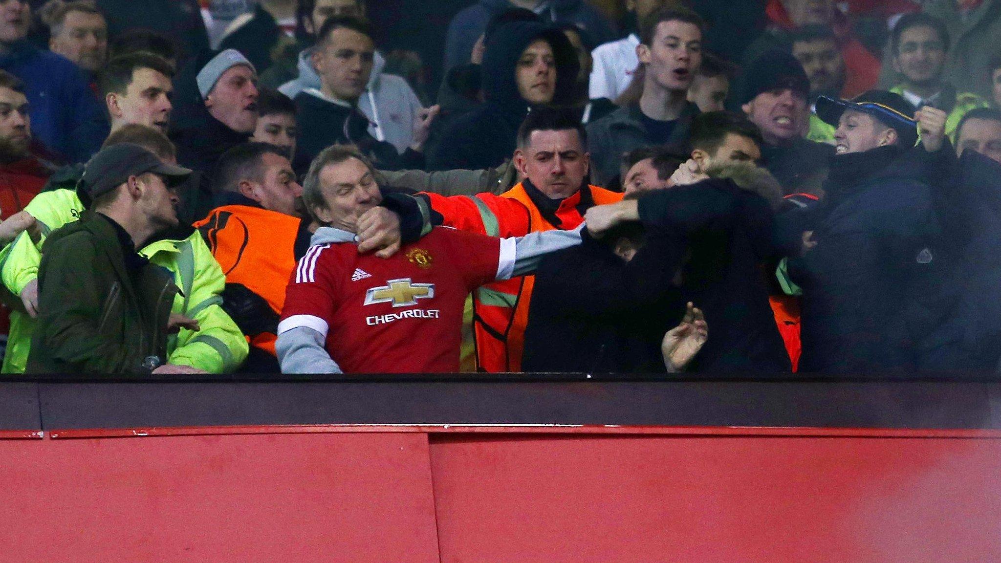 Stewards had to step in as trouble flared between fans at Old Trafford