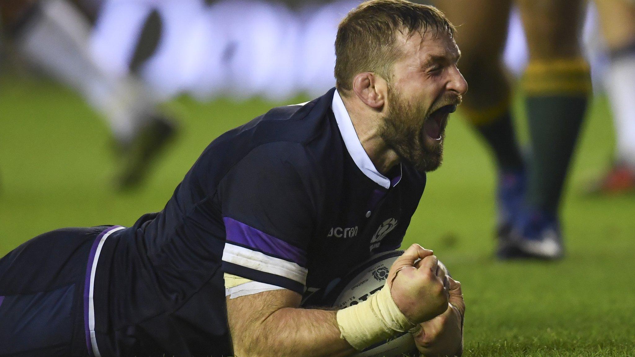 Scotland captain John Barclay scores a try against Australia