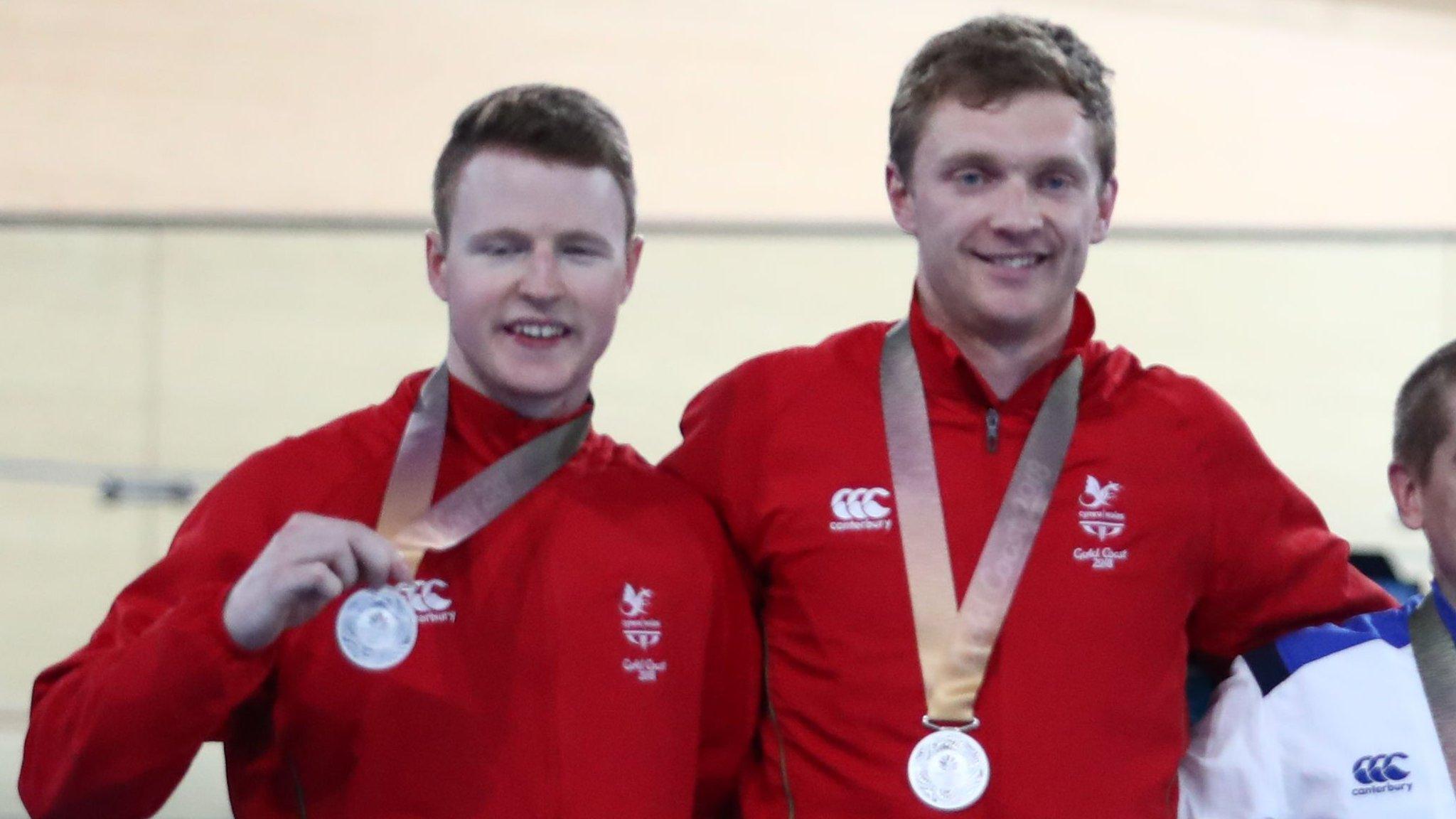 James Ball and pilot Peter Mitchell with their silver medals