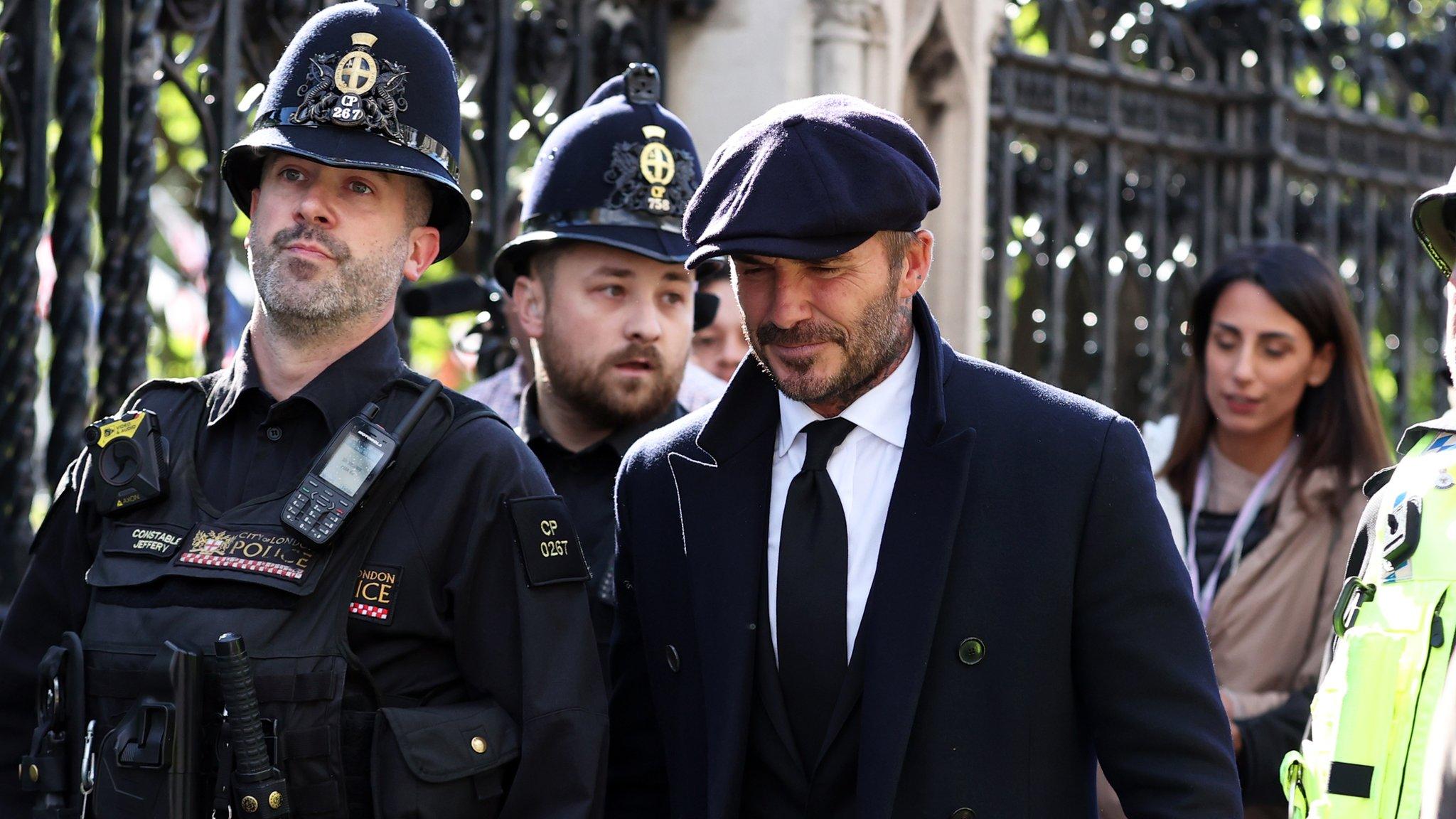 David Beckham leaves Westminster Hall after paying tribute to the Queen