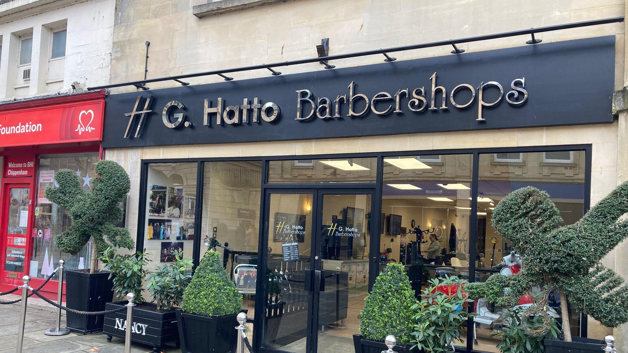 A barbershop front window