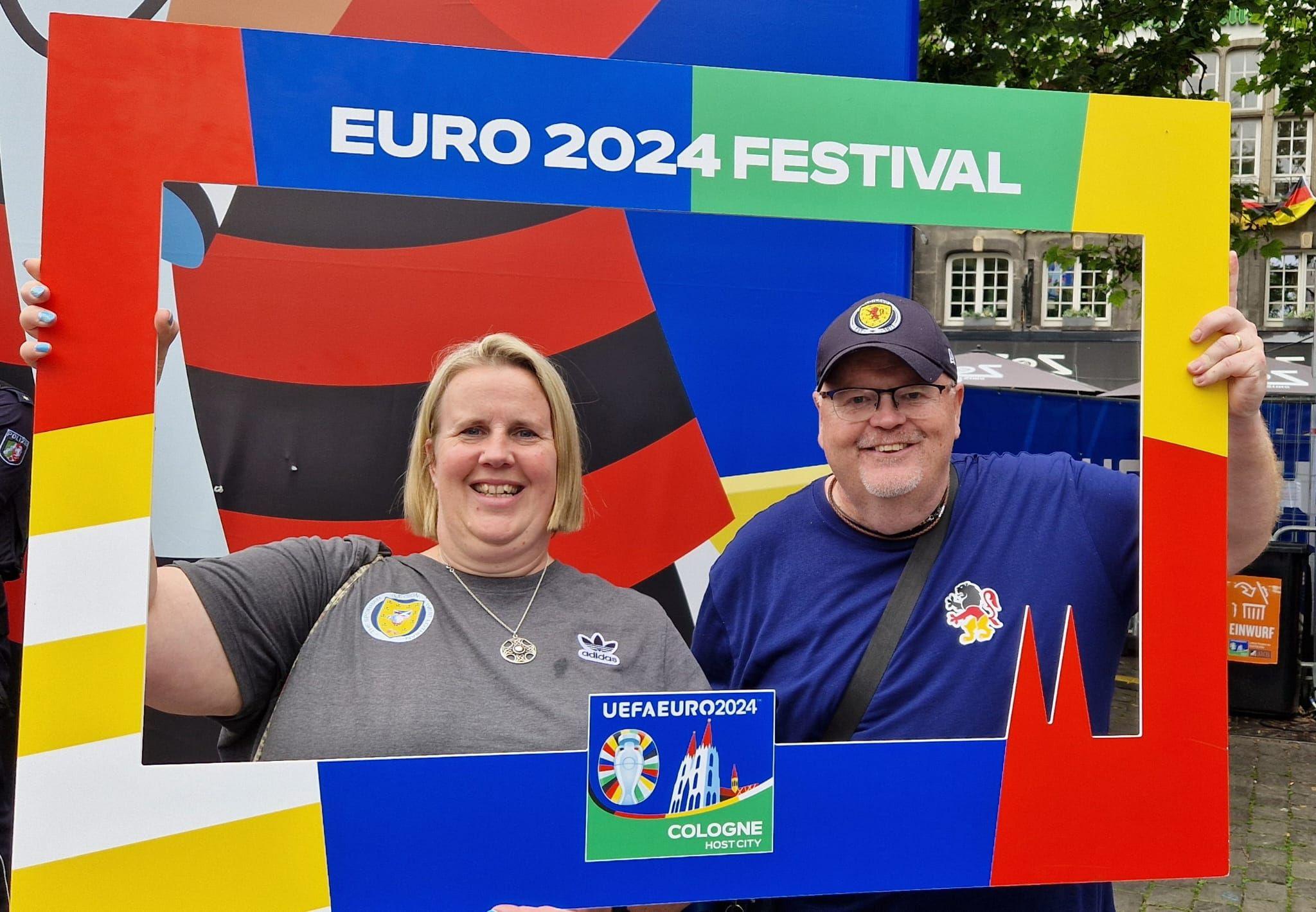 Fiona McGinty and husband Graeme pose in a Euros 2024 picture frame