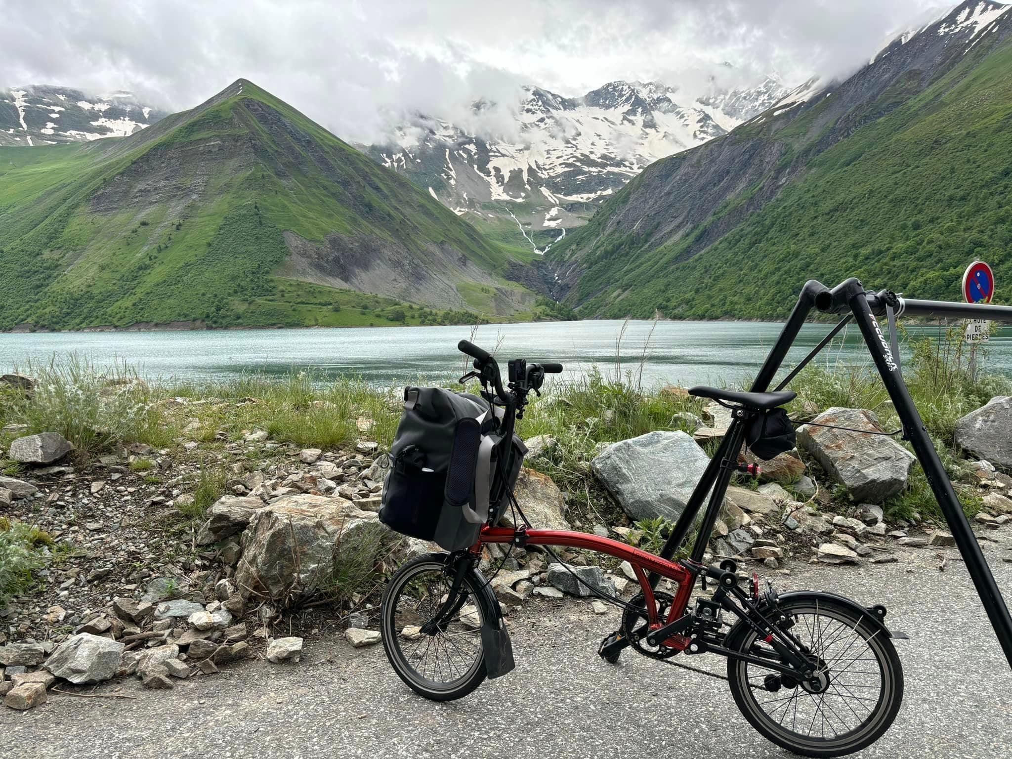 Manx man completes five day French Alps cycle on foldable bike BBC News