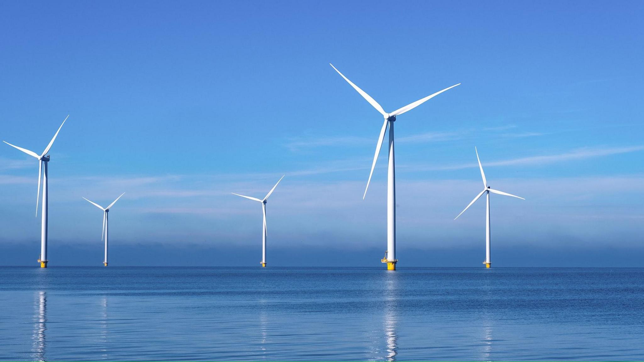 wind turbines in the ocean.