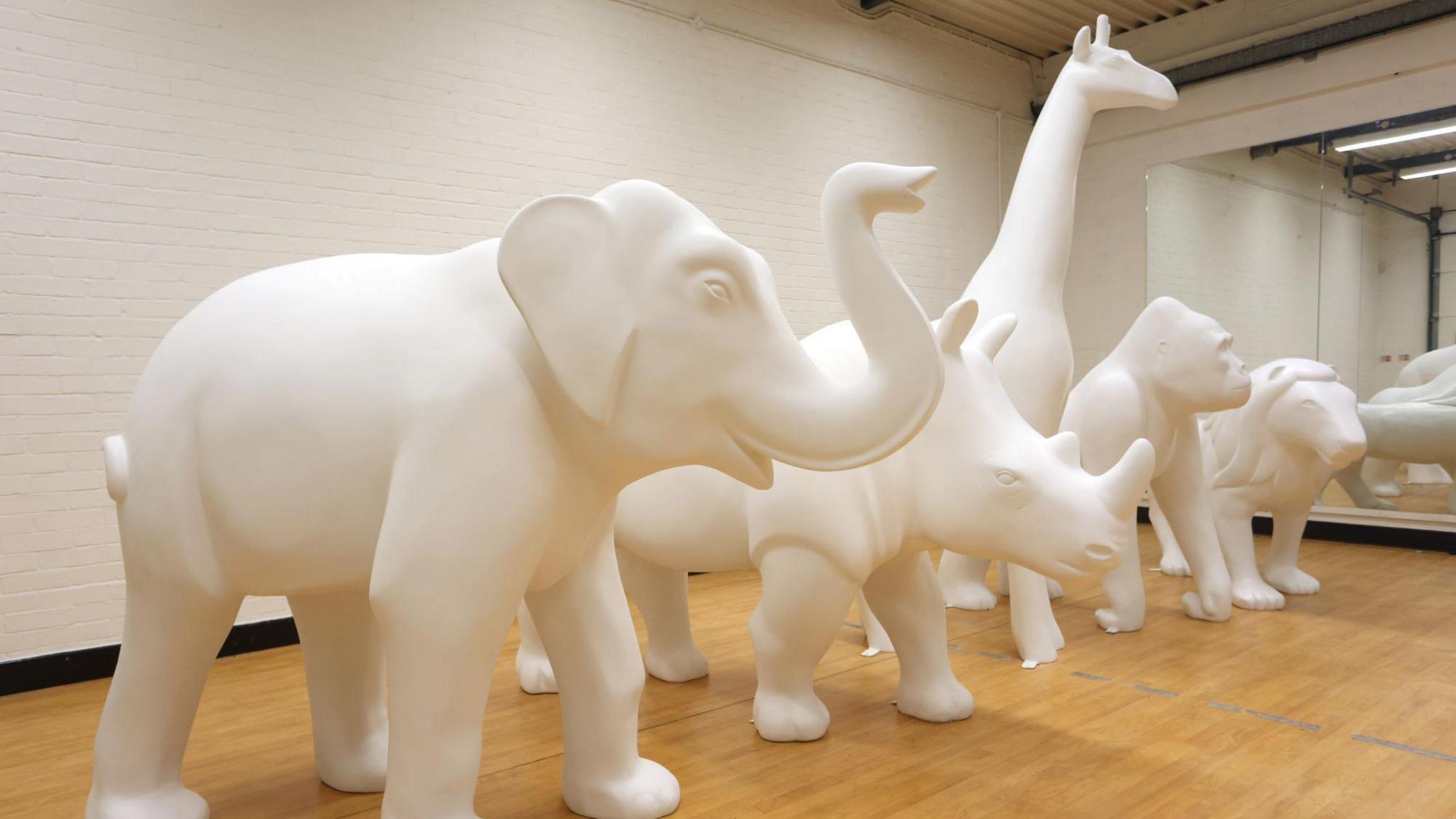 Unpainted animal sculptures