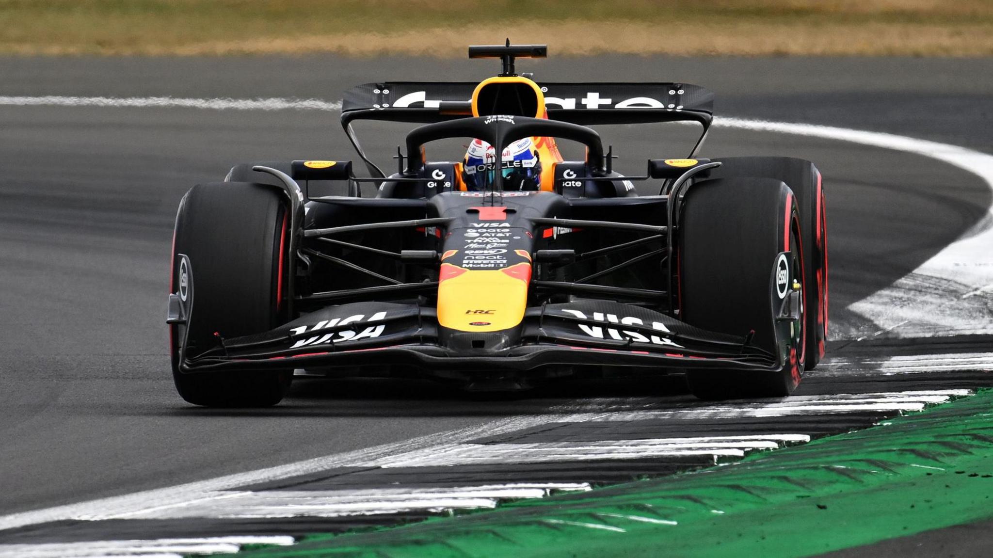 Max Verstappen driving nan Red Bull during British Grand Prix qualifying