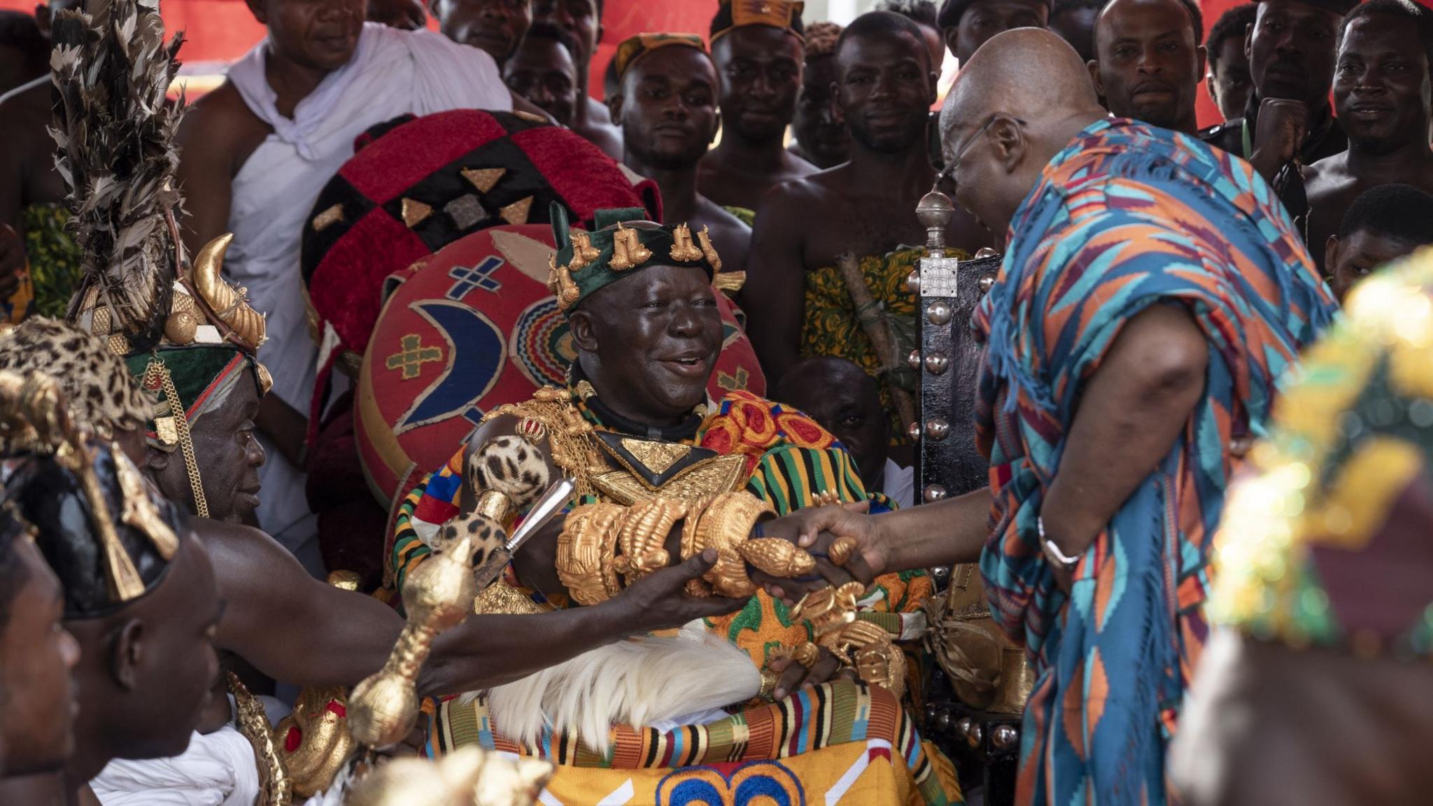 Nana Addo Dankwa Akufo-Addo, president of Ghana, greets the Asantehene, Otumfuo Osei Tutu II, at the Akwasidae celebration and the returned looted artefacts of the Asante Kingdom on May 12,2024, in Kumasi, Ghana.