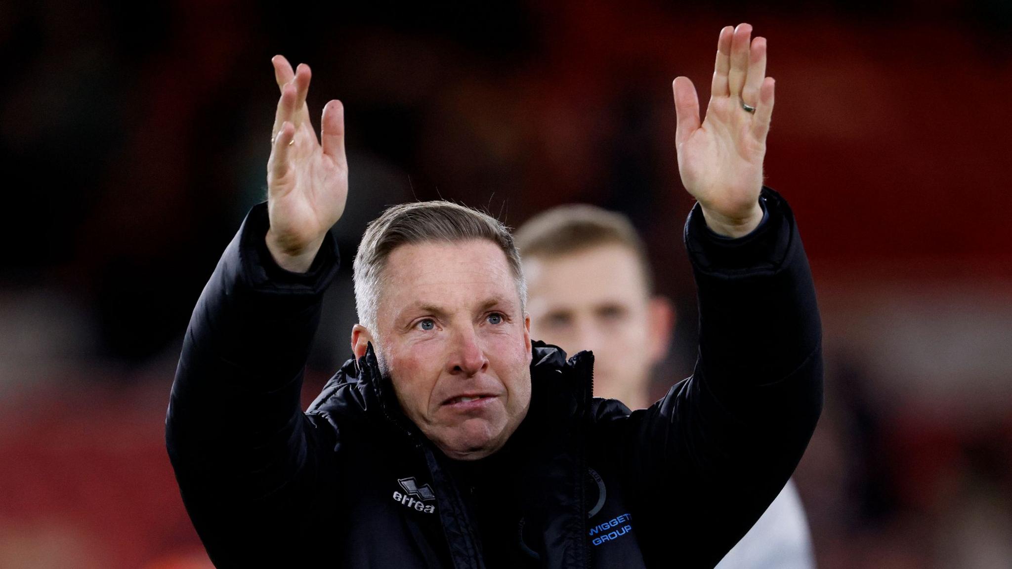 Neil Harris applauds the Millwall fans after the Championship match at Middlesbrough