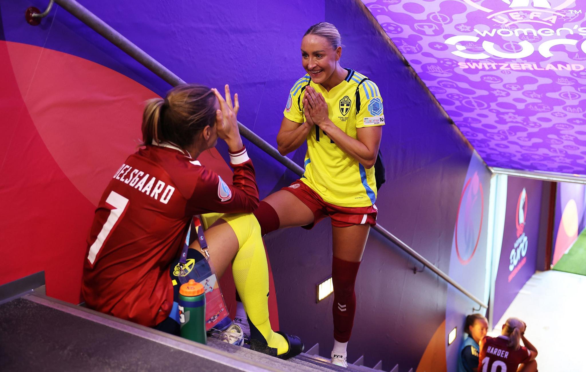 Denmark's Sanne Troelsgaard chats to Sweden's Nathalie Bjoern inside the players tunnel following their teams facing  each other. Photo by Charlotte Wilson
