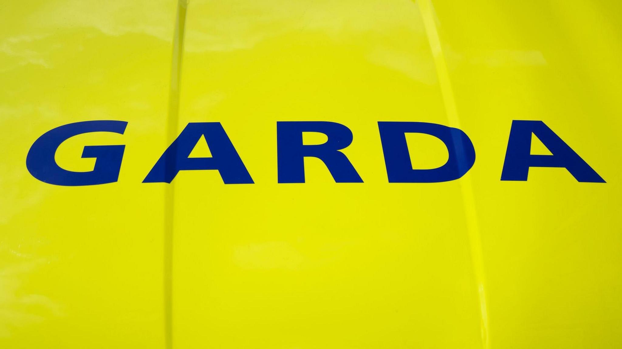 Neon Garda sign