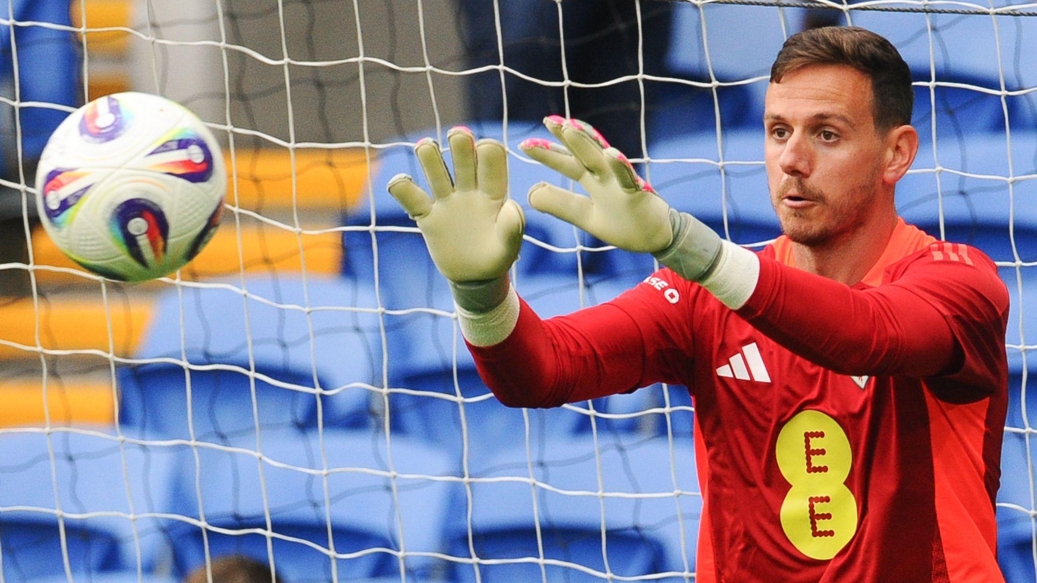 Wales' Danny Ward prepares to catch an approaching ball