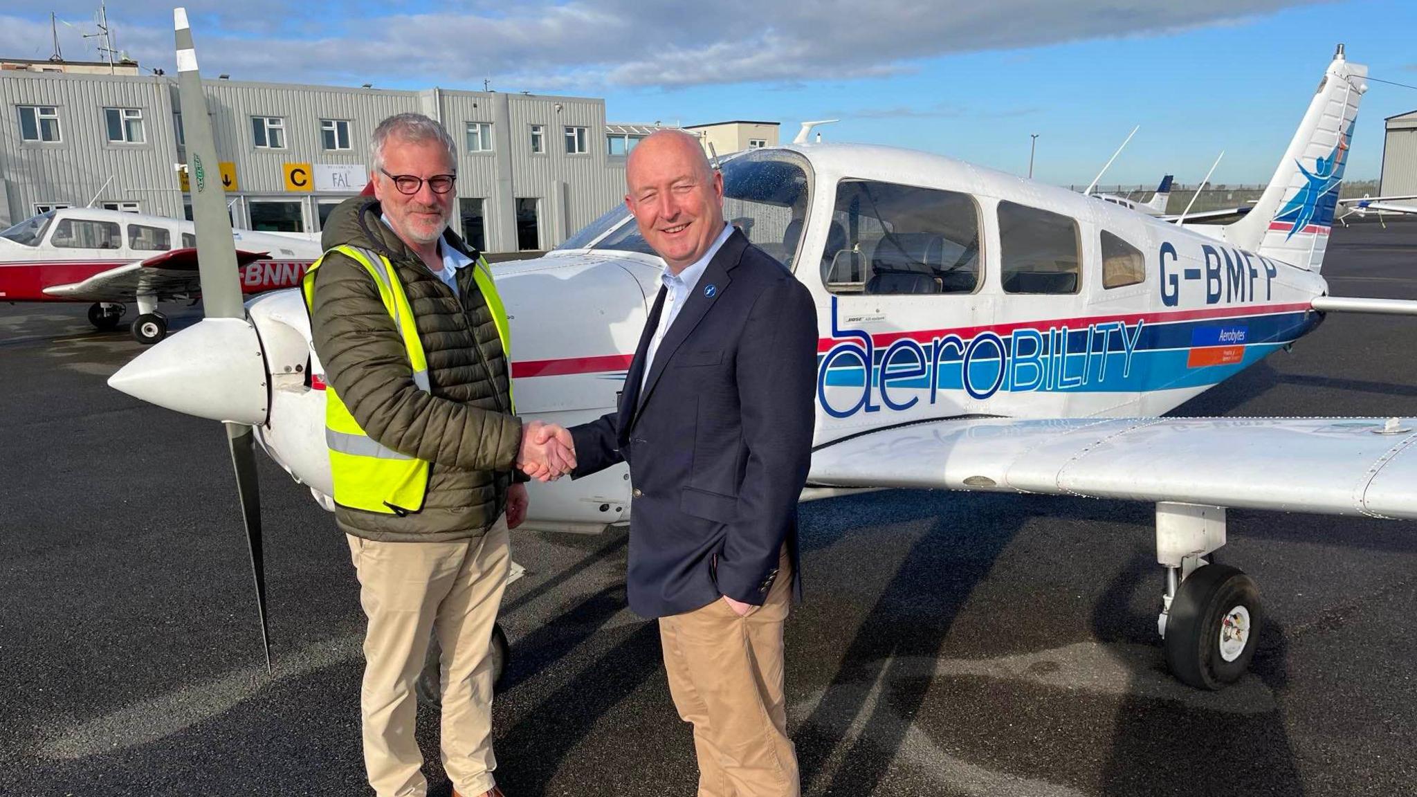 Adrian Stephens of Lydd Aero Club with Al Rosser, chief flying instructor at Aerobility