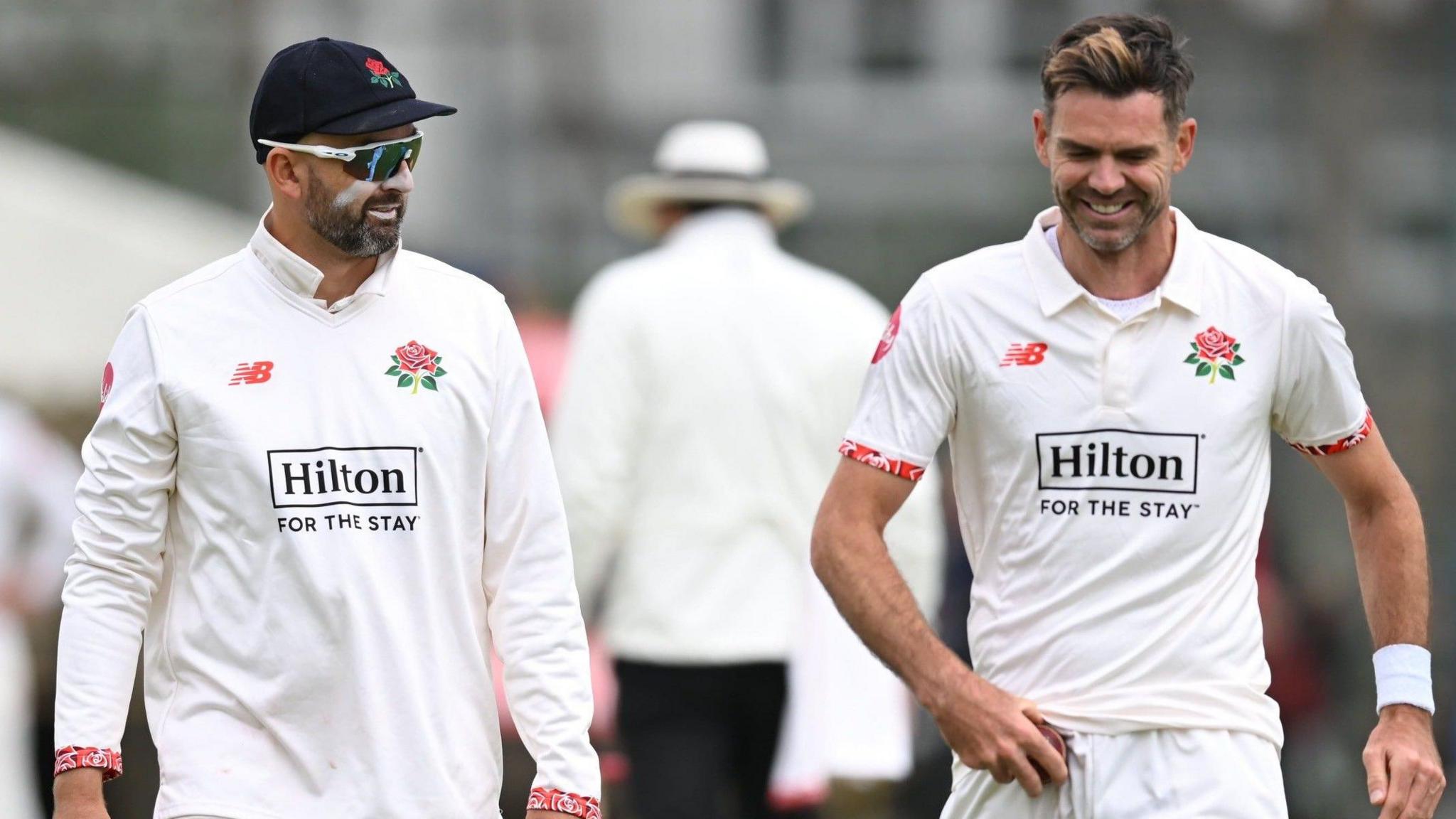 Nathan Lyon and Jimmy Anderson share a joke at Southport