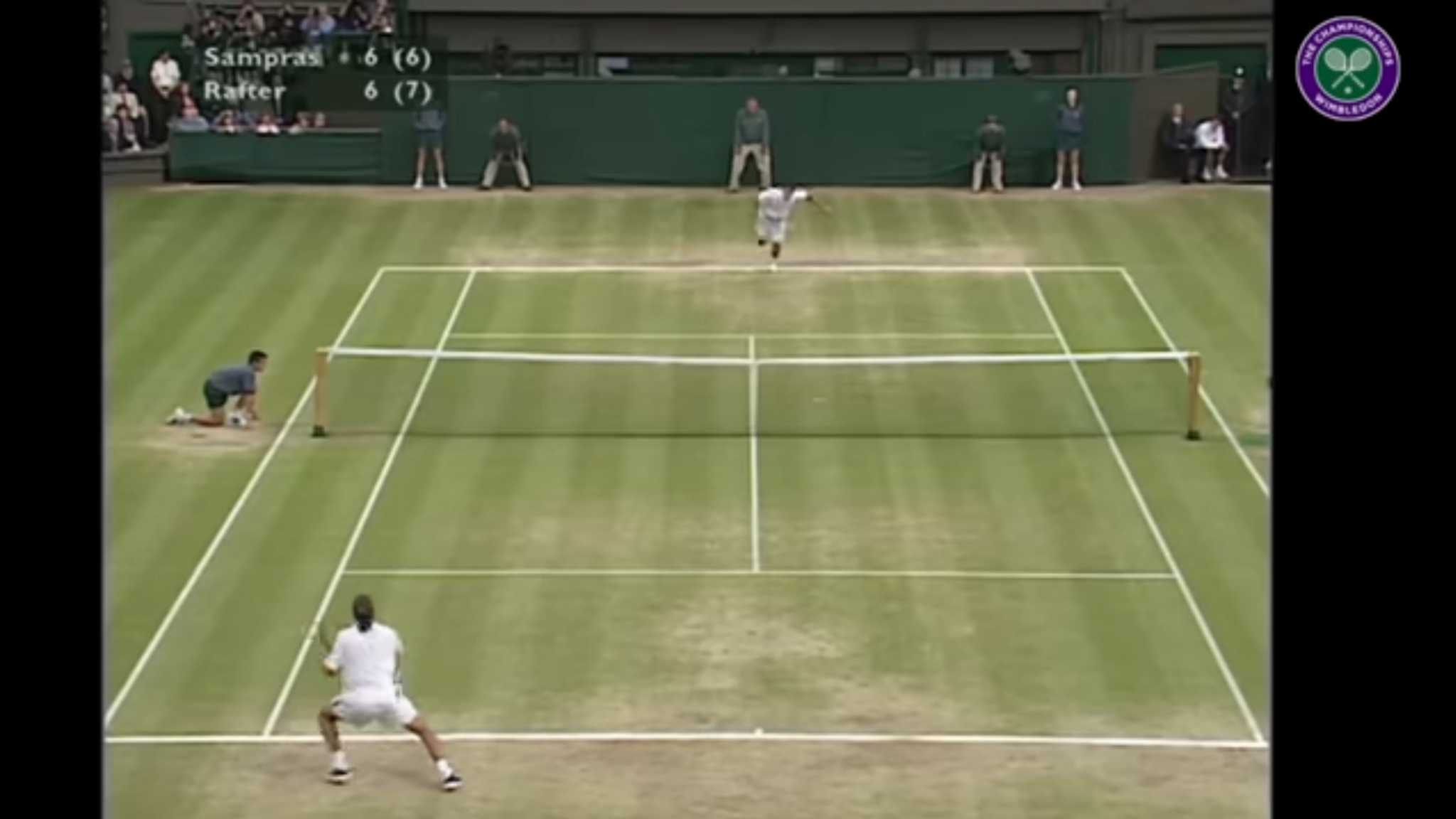 Wimbledon 2000 court shows more wear on the baseline but still a clear 'T' in the middle