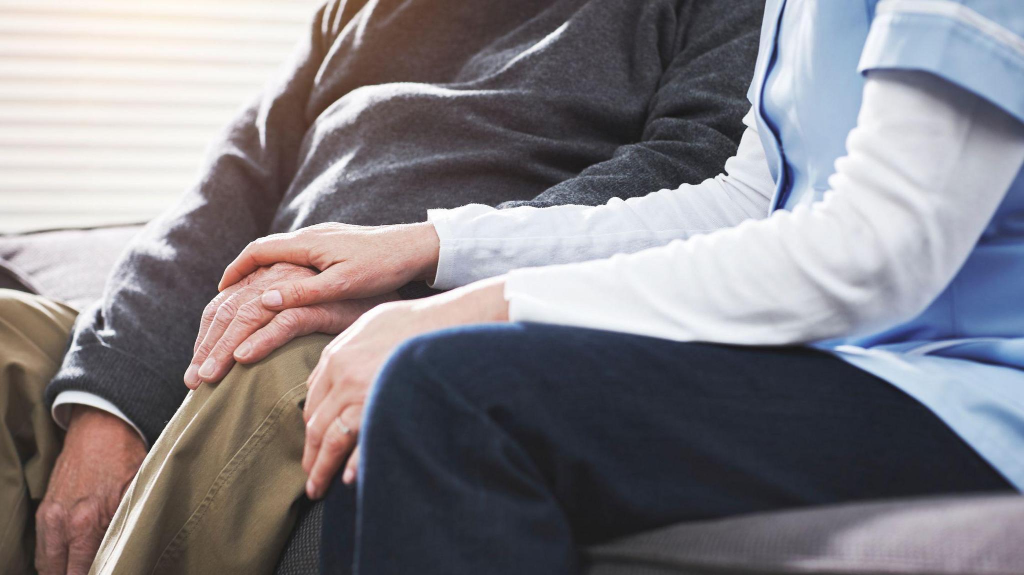 Nurse with elderly patient