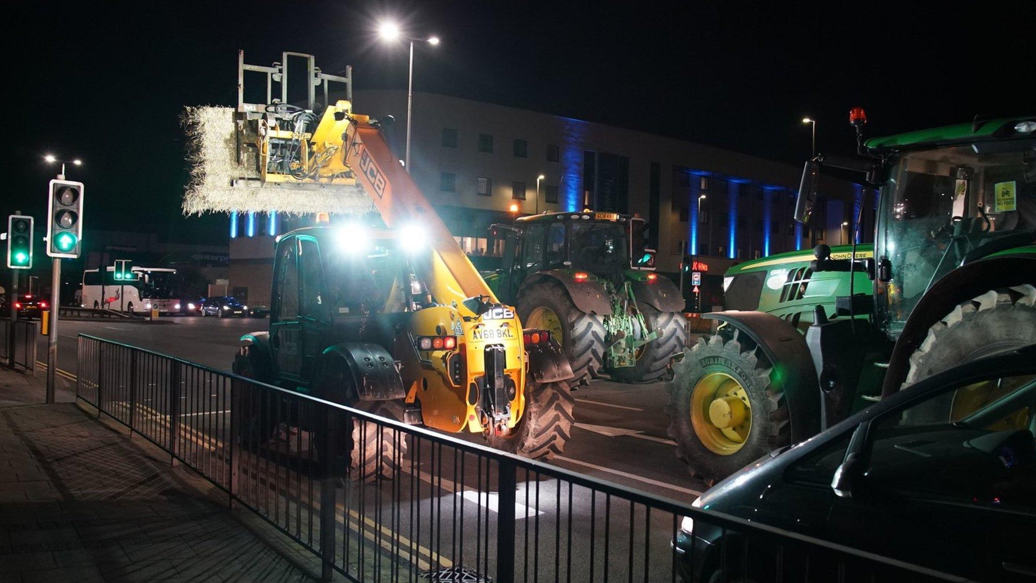 Protest tractors line up at a traffic light junction in Dover