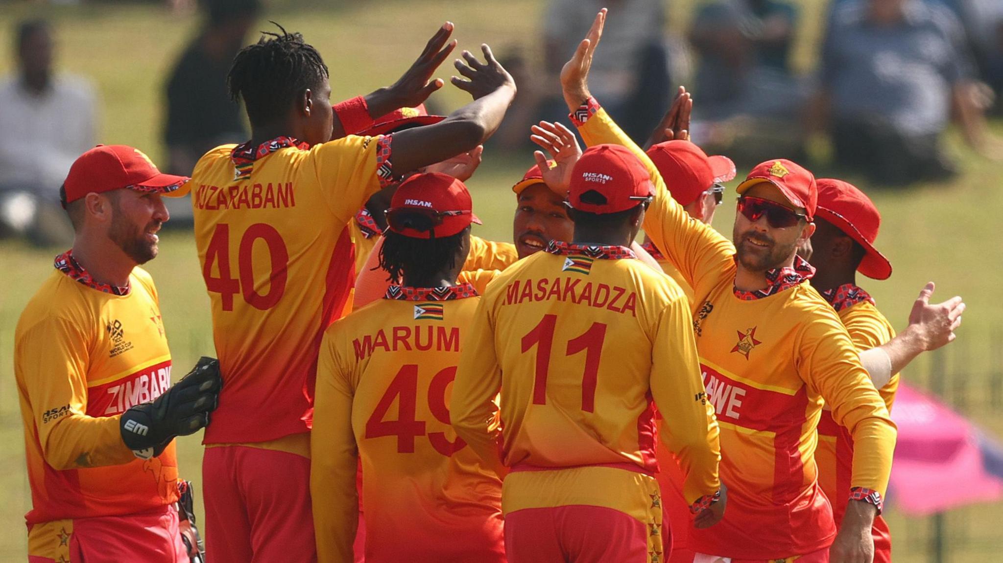 Zimbabwe's players celebrate a wicket for Blessing Muzarabani 