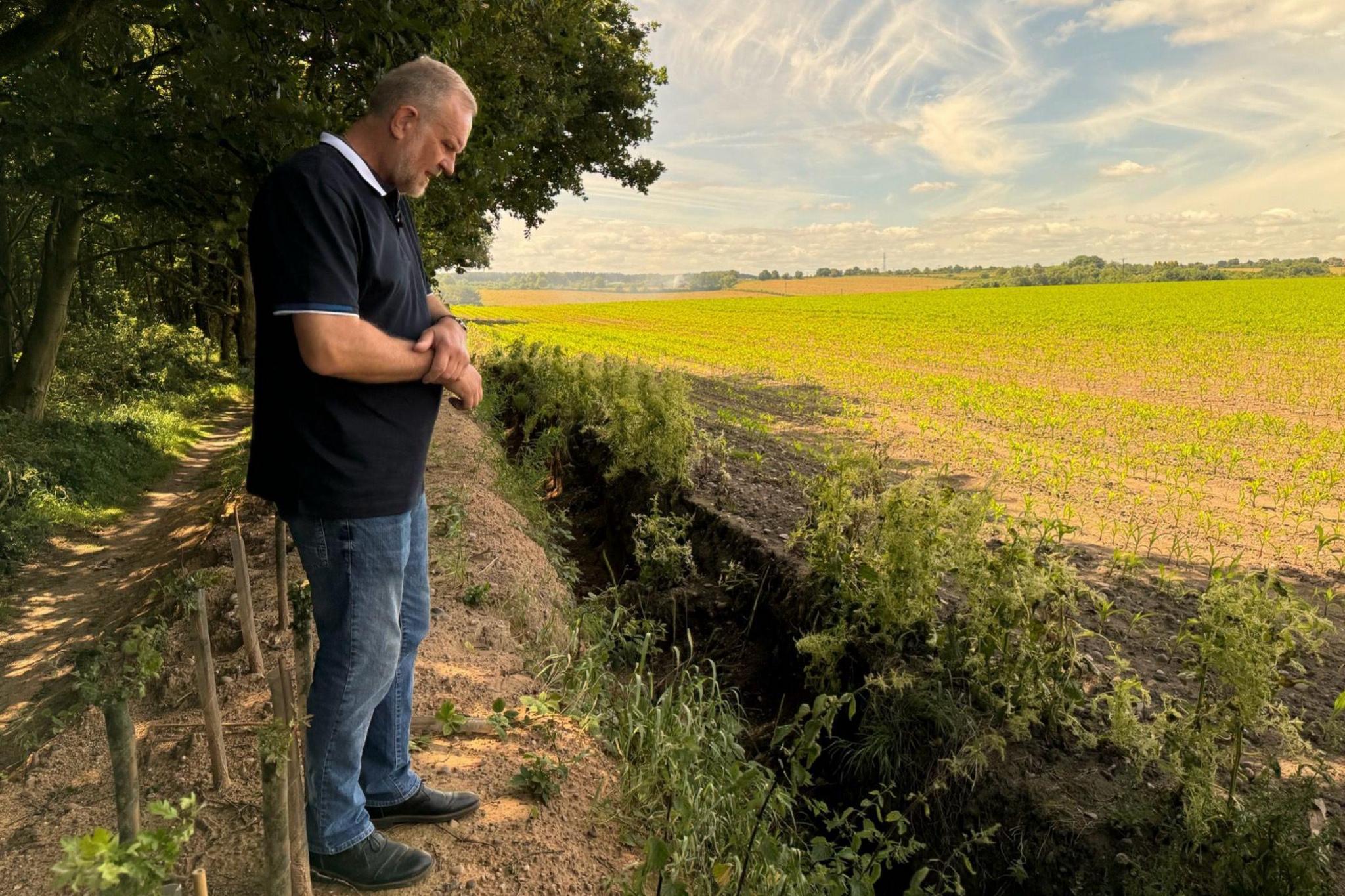 Russell Lowbridge at the site where his grandfather's remains were found