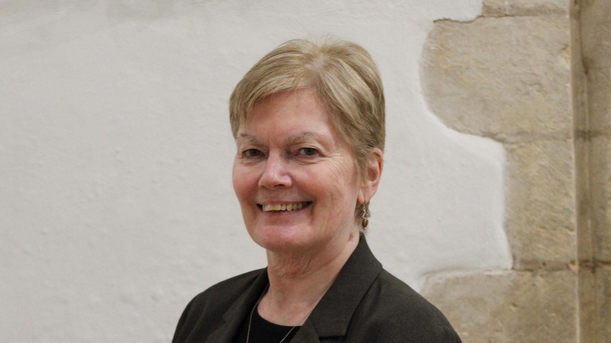 Council leader Gale Waller posing inside the council offices
