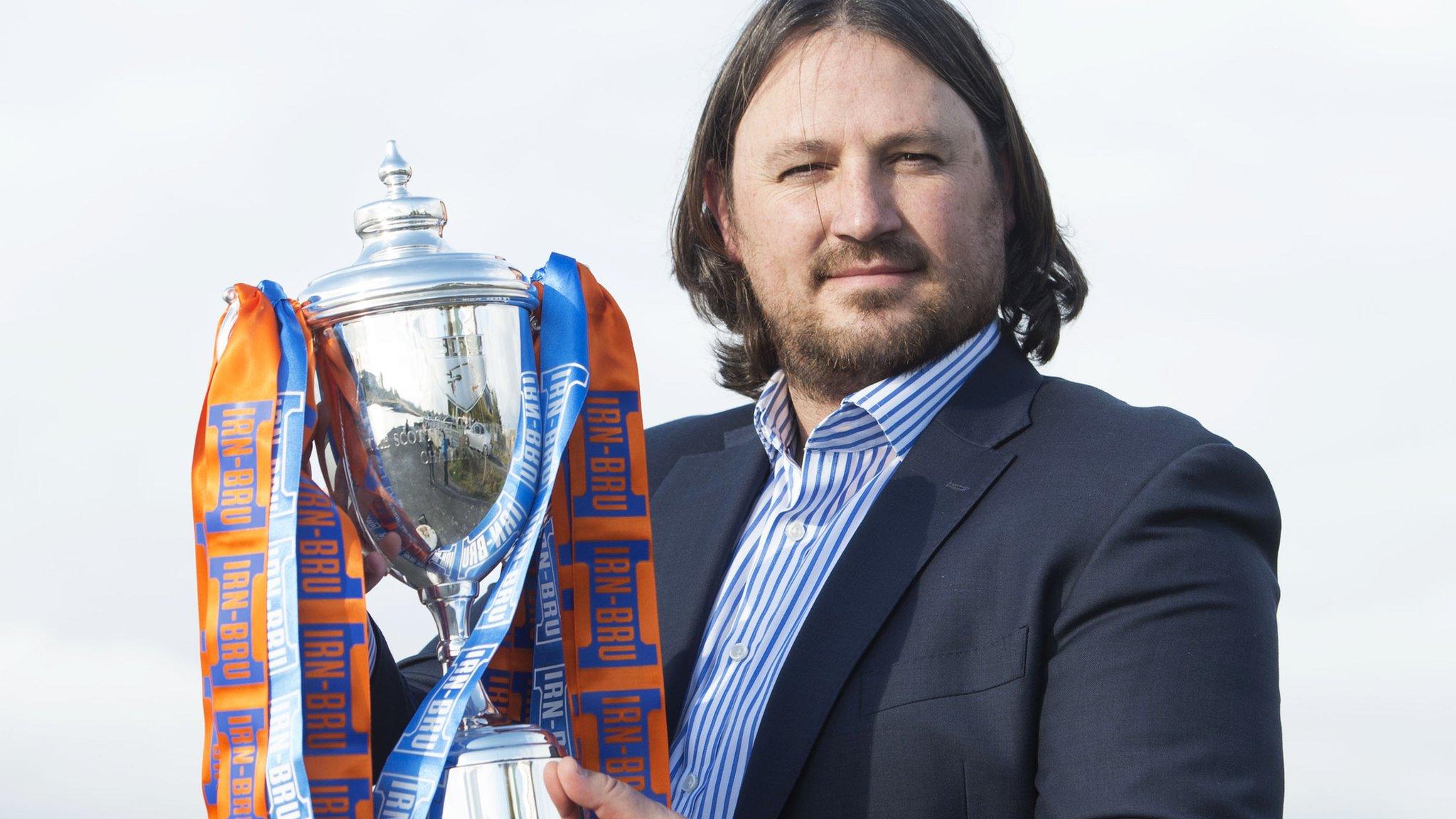 New Saints manager Craig Harrison with the Scottish Challenge Cup