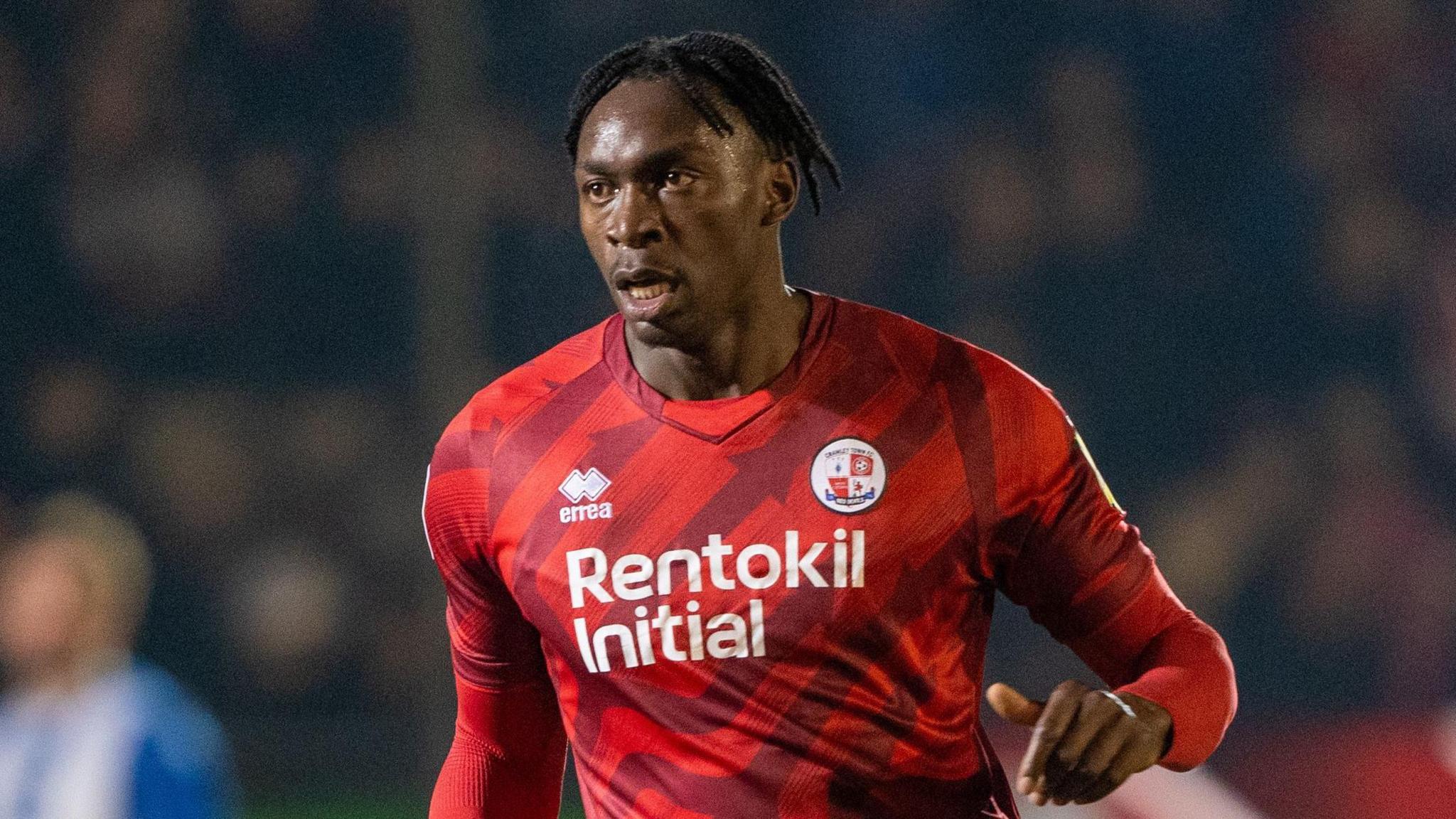 Tola Showunmi on the pitch during a match for Crawley