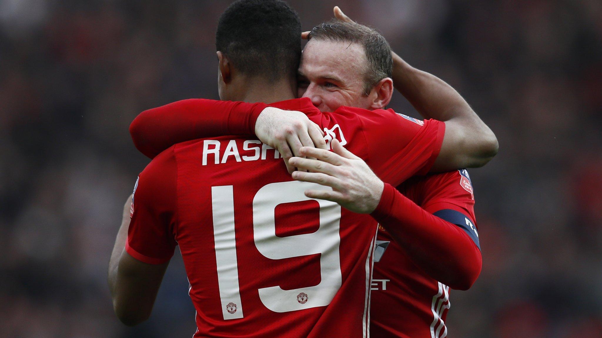 Wayne Rooney and Marcus Rashford celebrate