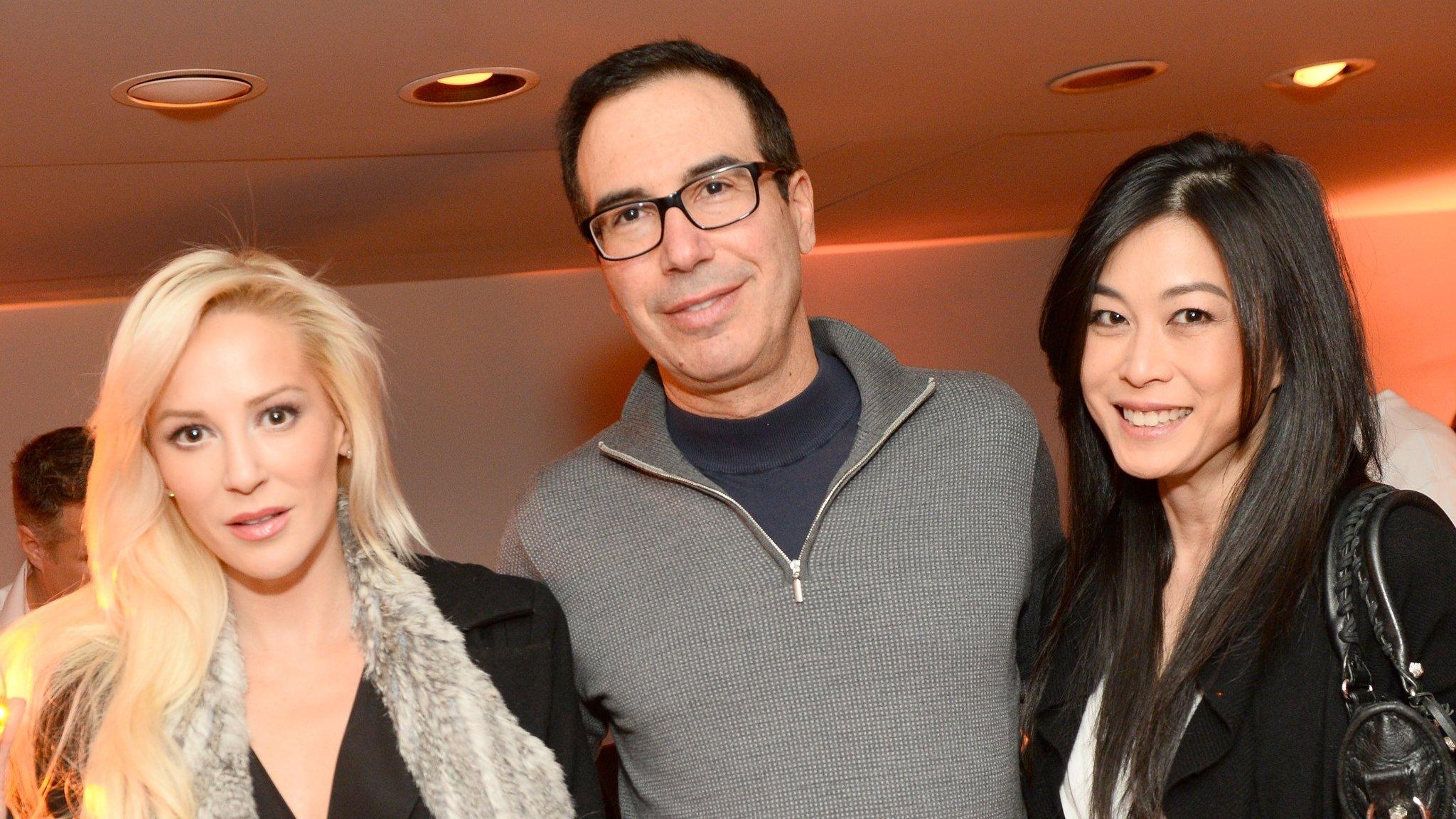 Steve Mnuchin pictured with fiancee Louise Linton (left) and film producer Tina Sutakanat