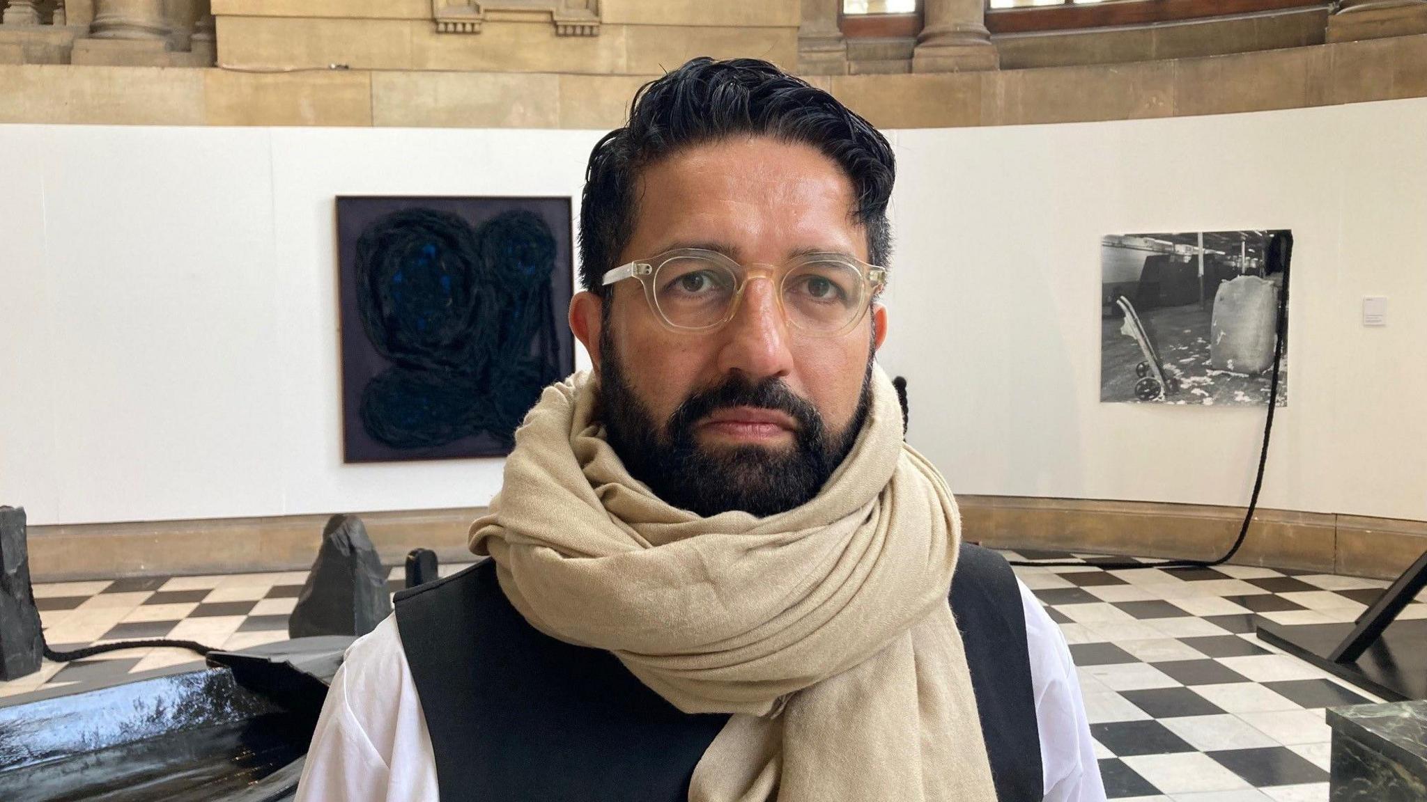 Osman Yousefzada inside Cartwright Hall art gallery