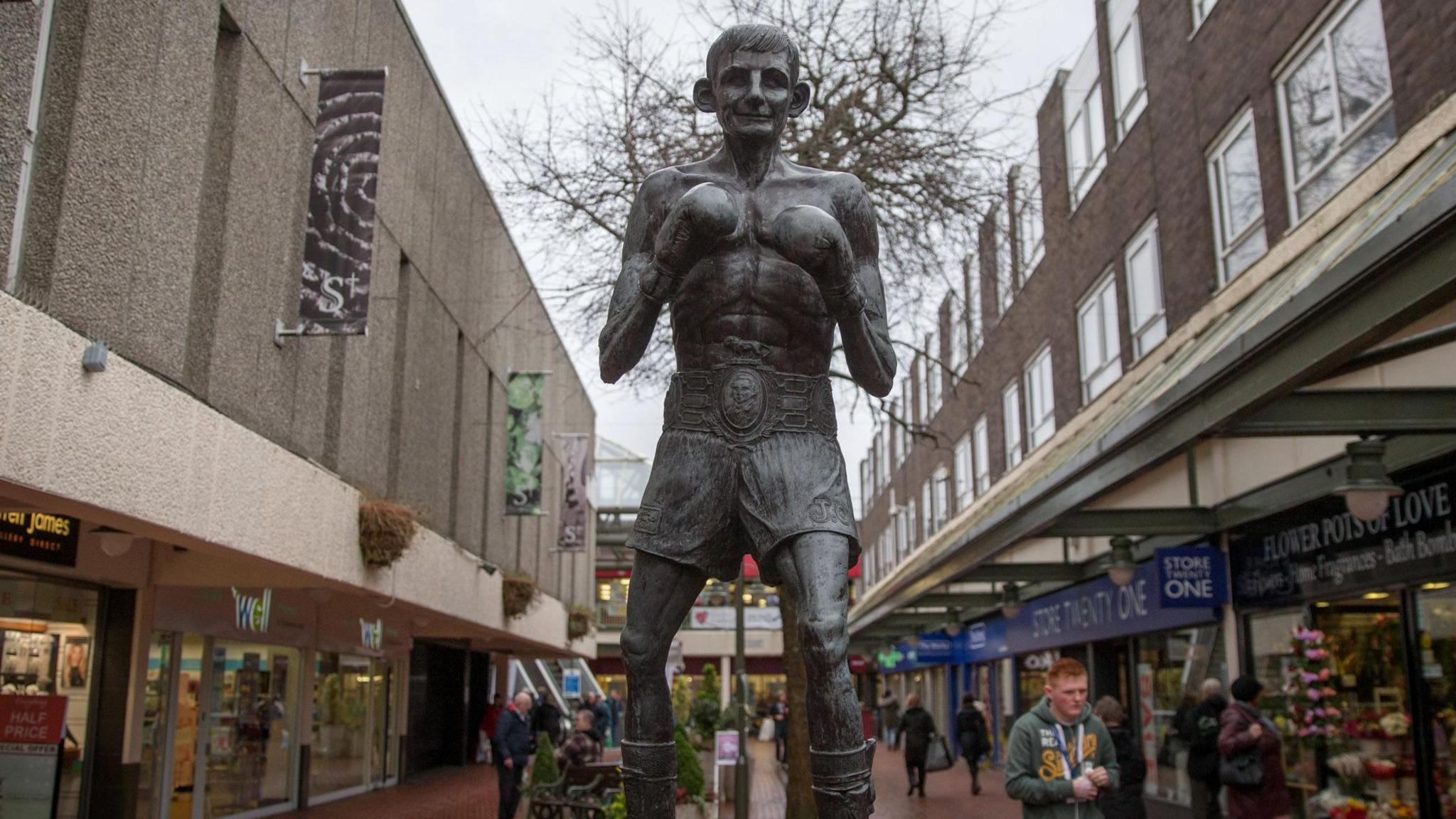 A life-size bronze statue of Johnny Owen inside the main shopping centre in Merthyr Tydfil 