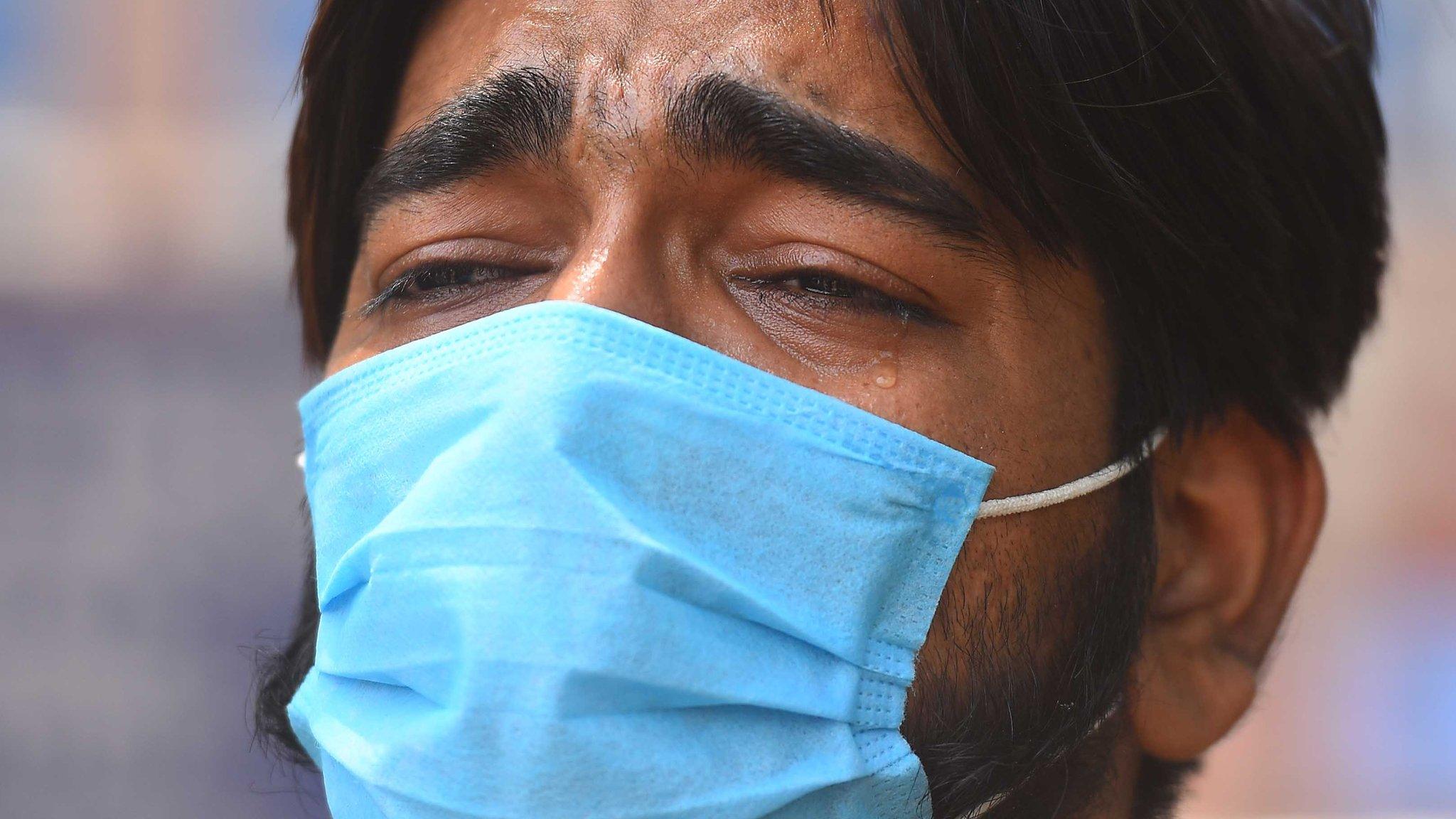 NEW DELHI, INDIA - APRIL 26: A relative of Covid-19 patient cries as he waits for admission at Lok Nayak Jai Prakash (LNJP) hospital, on April 26, 2021 in New Delhi, India. (Photo by Raj K Raj/Hindustan Times via Getty Images)