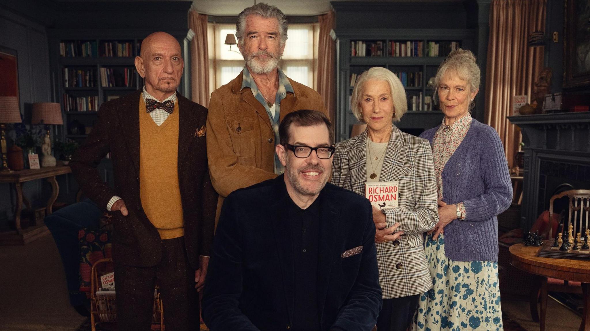 Sir Ben Kingsley, Pierce Brosnan, Helen Mirren, Richard Osman, Celia Imrie posing together on the film set