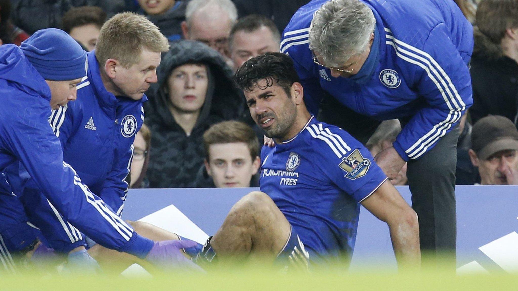 Chelsea striker Diego Costa receives treatment during his side's draw with Everton