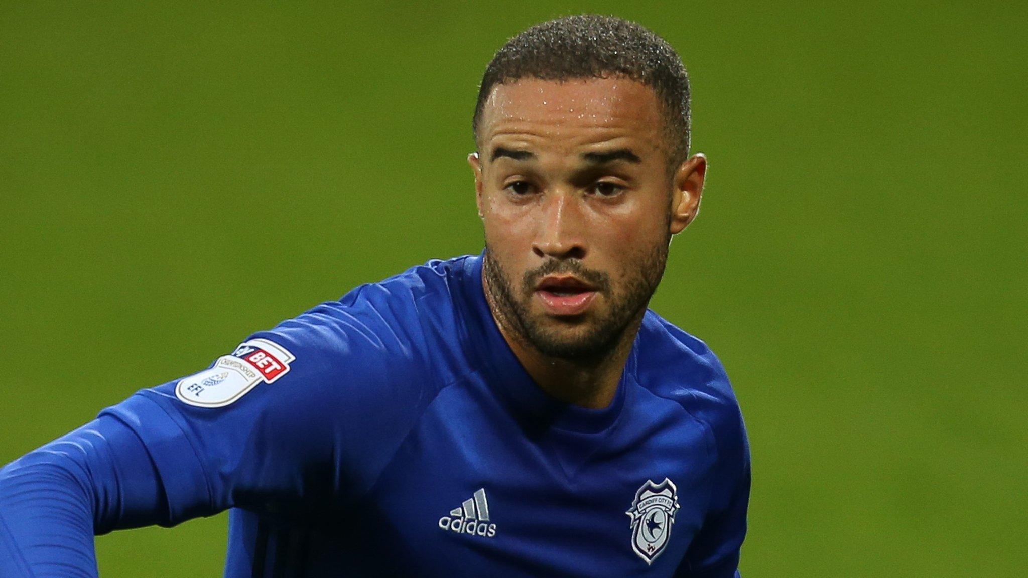 Jazz Richards goes after the ball for Cardiff City