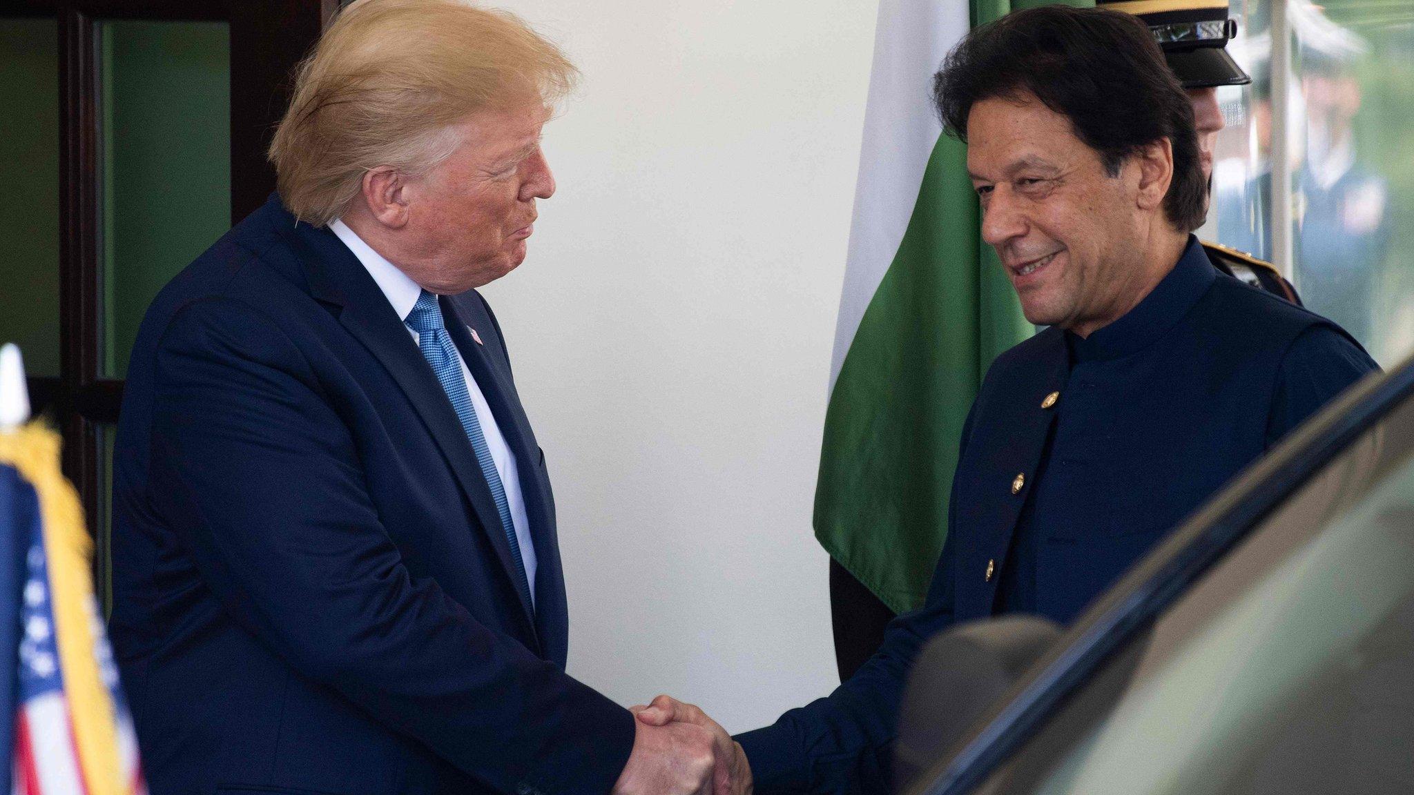 Donald Trump and Imran Khan shake hands at the White House