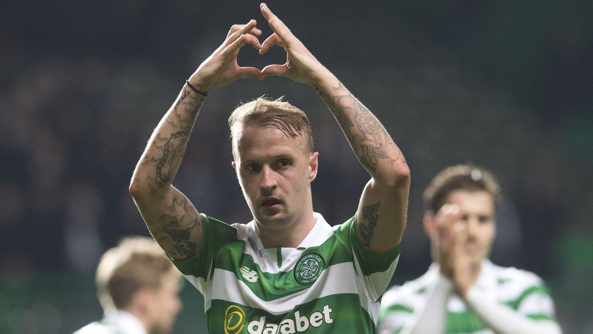 Celtic striker Leigh Griffiths celebrates victory